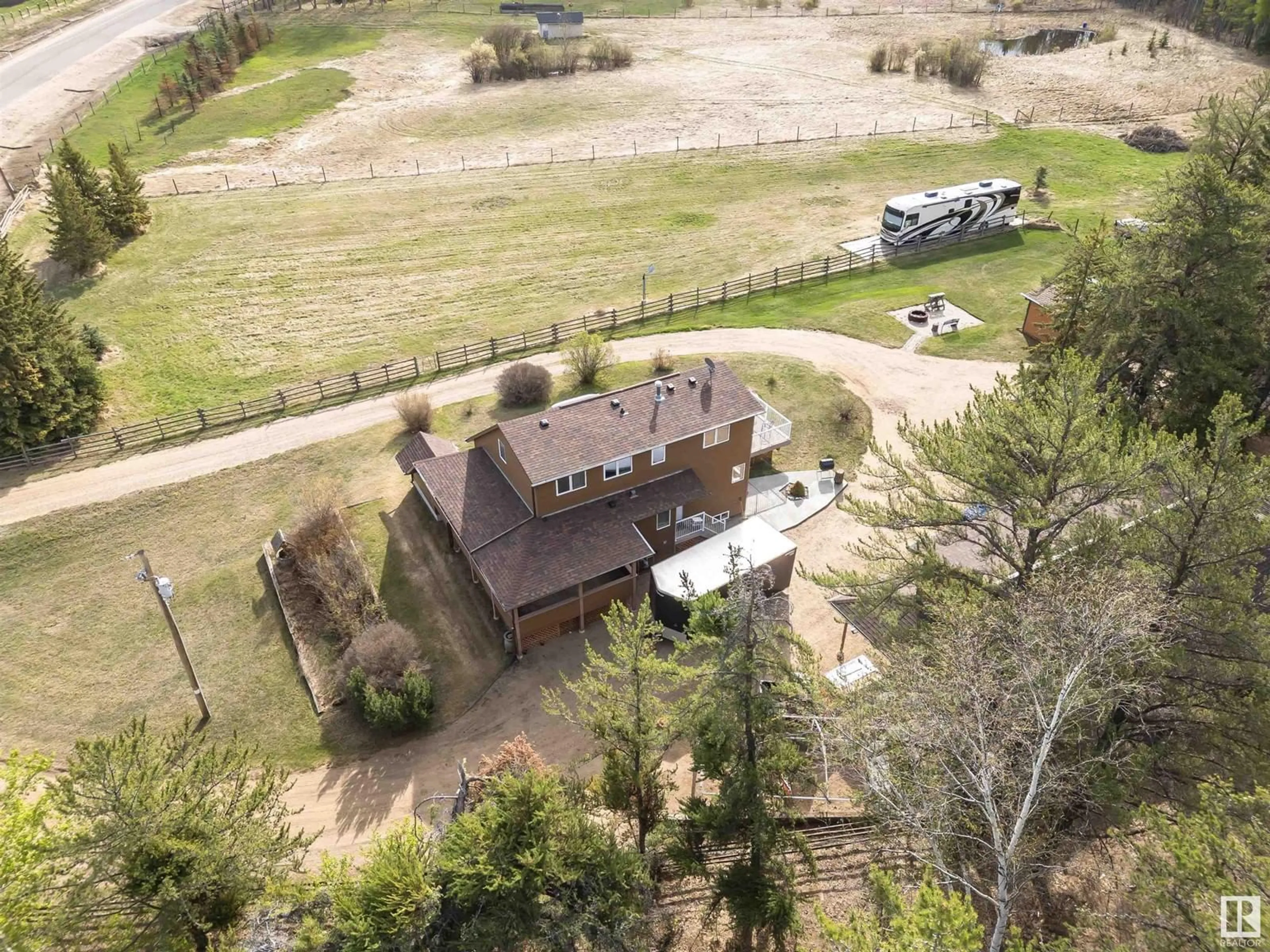 A pic from outside/outdoor area/front of a property/back of a property/a pic from drone, unknown for 153 ERICKSON DR, Rural Sturgeon County Alberta T0A1N6