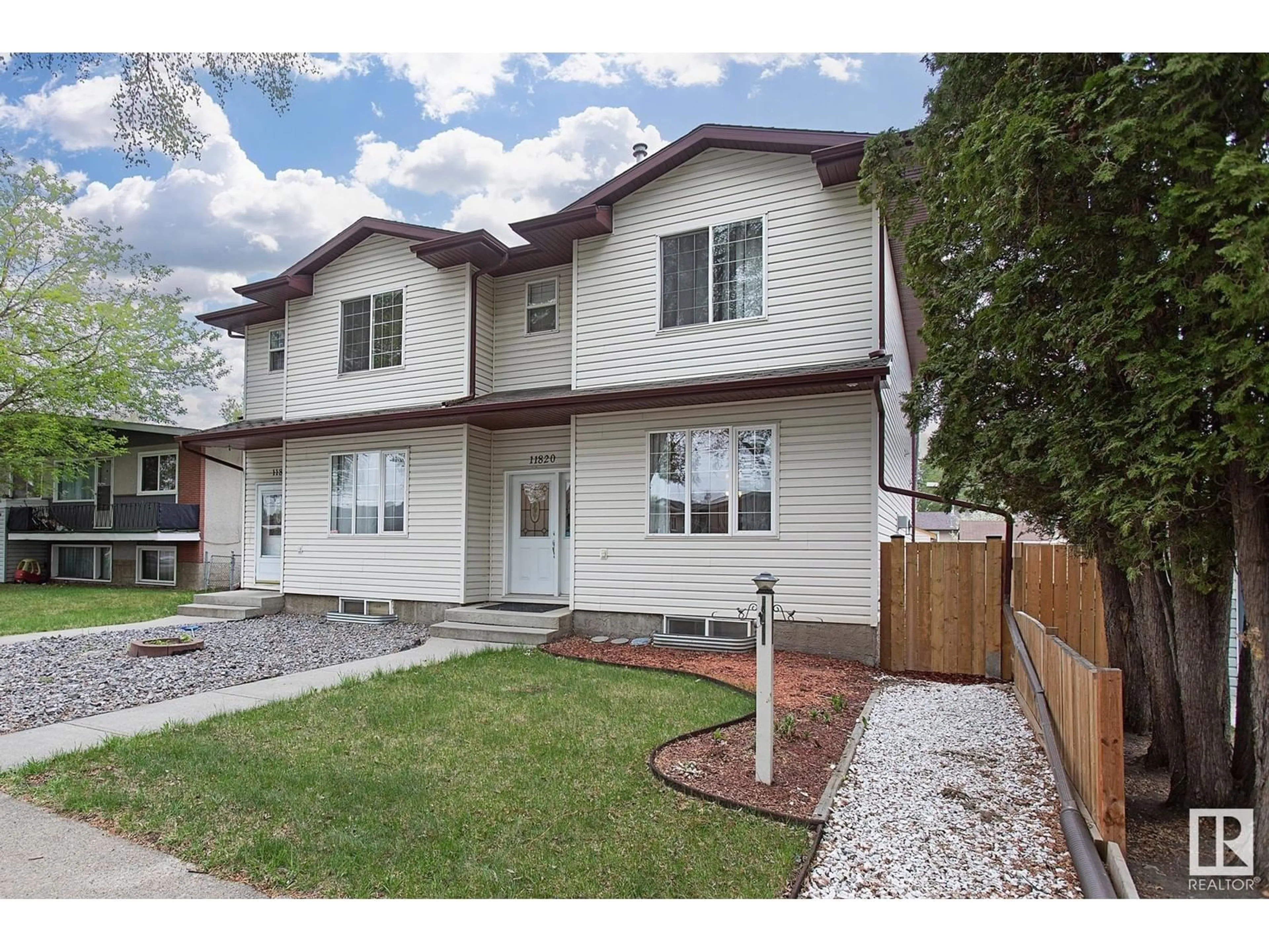 Home with vinyl exterior material, street for NW - 11820 40 ST, Edmonton Alberta T5W2K8