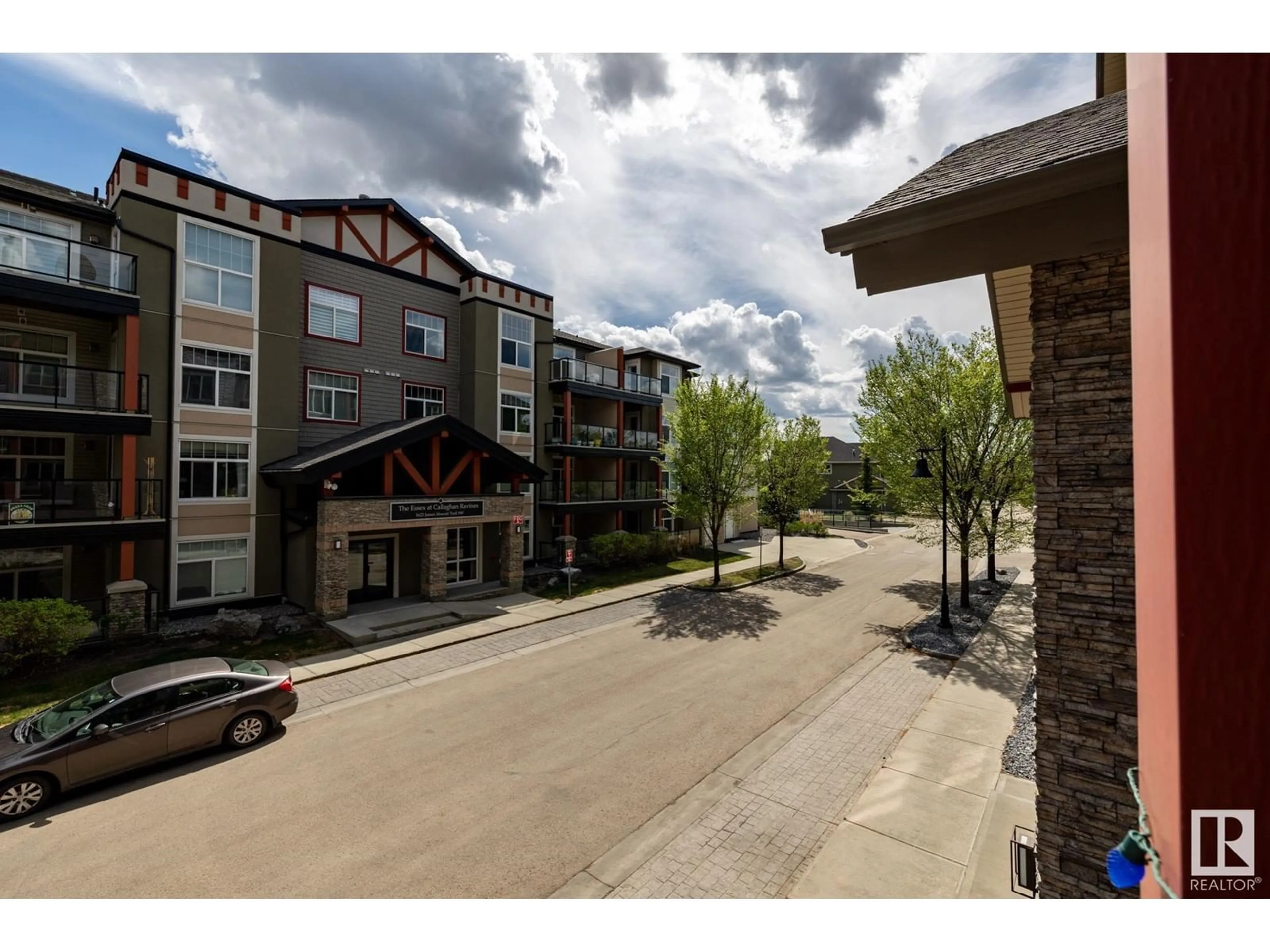 A pic from outside/outdoor area/front of a property/back of a property/a pic from drone, unknown for #203 - 1619 JAMES MOWATT TR, Edmonton Alberta T6W0J7