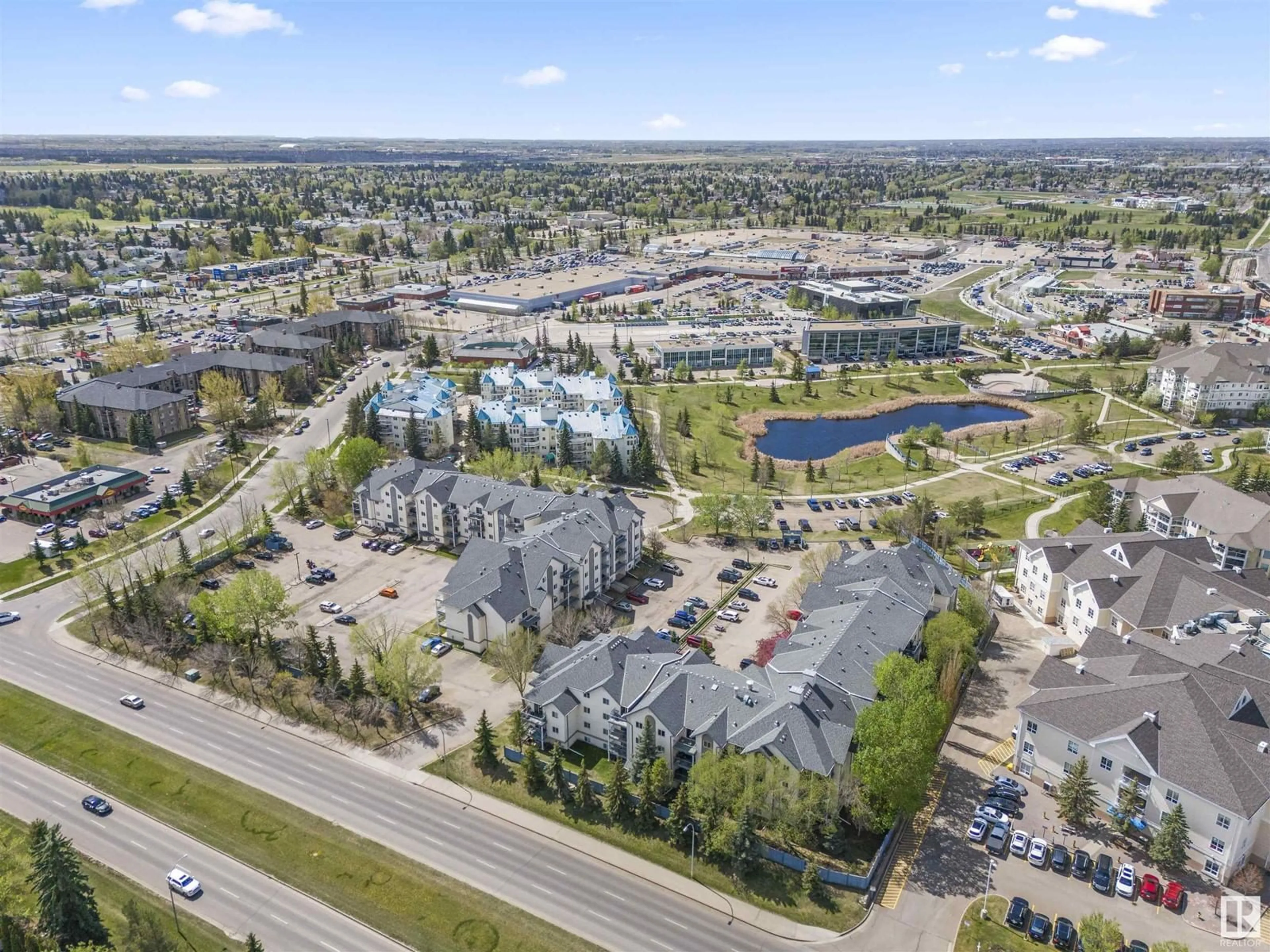 A pic from outside/outdoor area/front of a property/back of a property/a pic from drone, unknown for 129 - 2520 50 ST, Edmonton Alberta T6L7A8