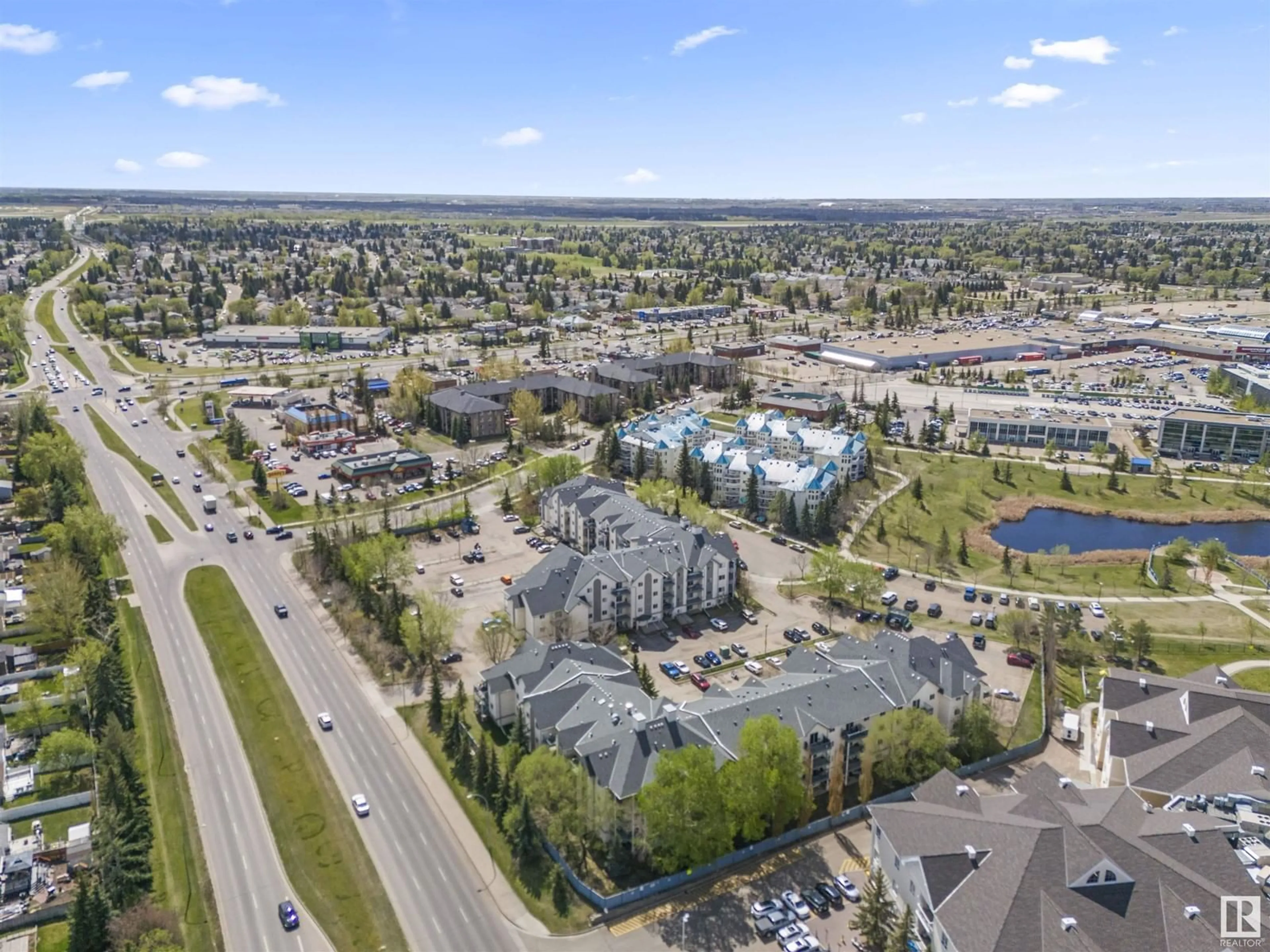 A pic from outside/outdoor area/front of a property/back of a property/a pic from drone, unknown for 129 - 2520 50 ST, Edmonton Alberta T6L7A8