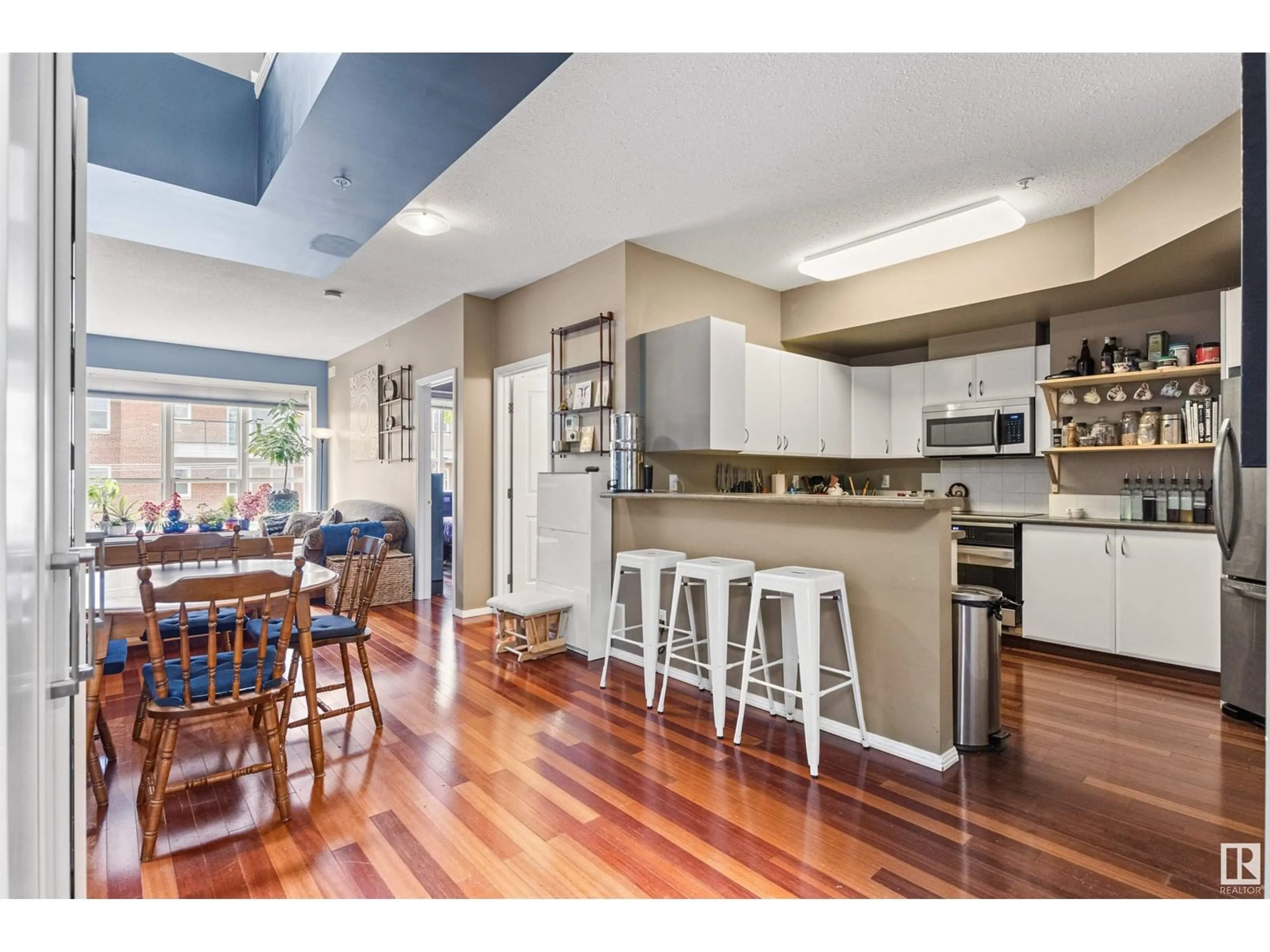 Open concept kitchen, wood/laminate floor for 417 - 10717 83 AV, Edmonton Alberta T6E2E5