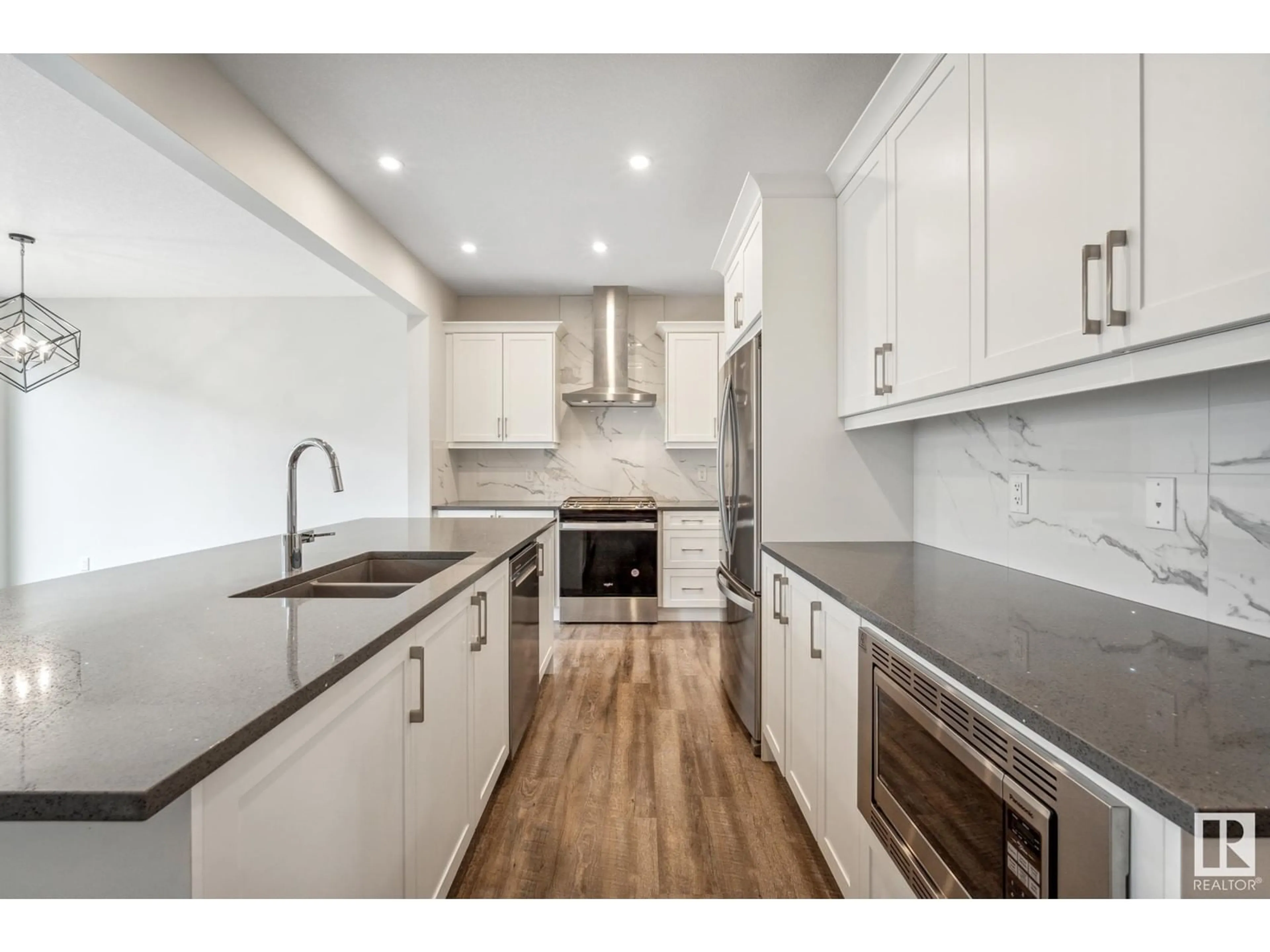 Open concept kitchen, unknown for 2233 DONAGHEY WY, Edmonton Alberta T6W5G1