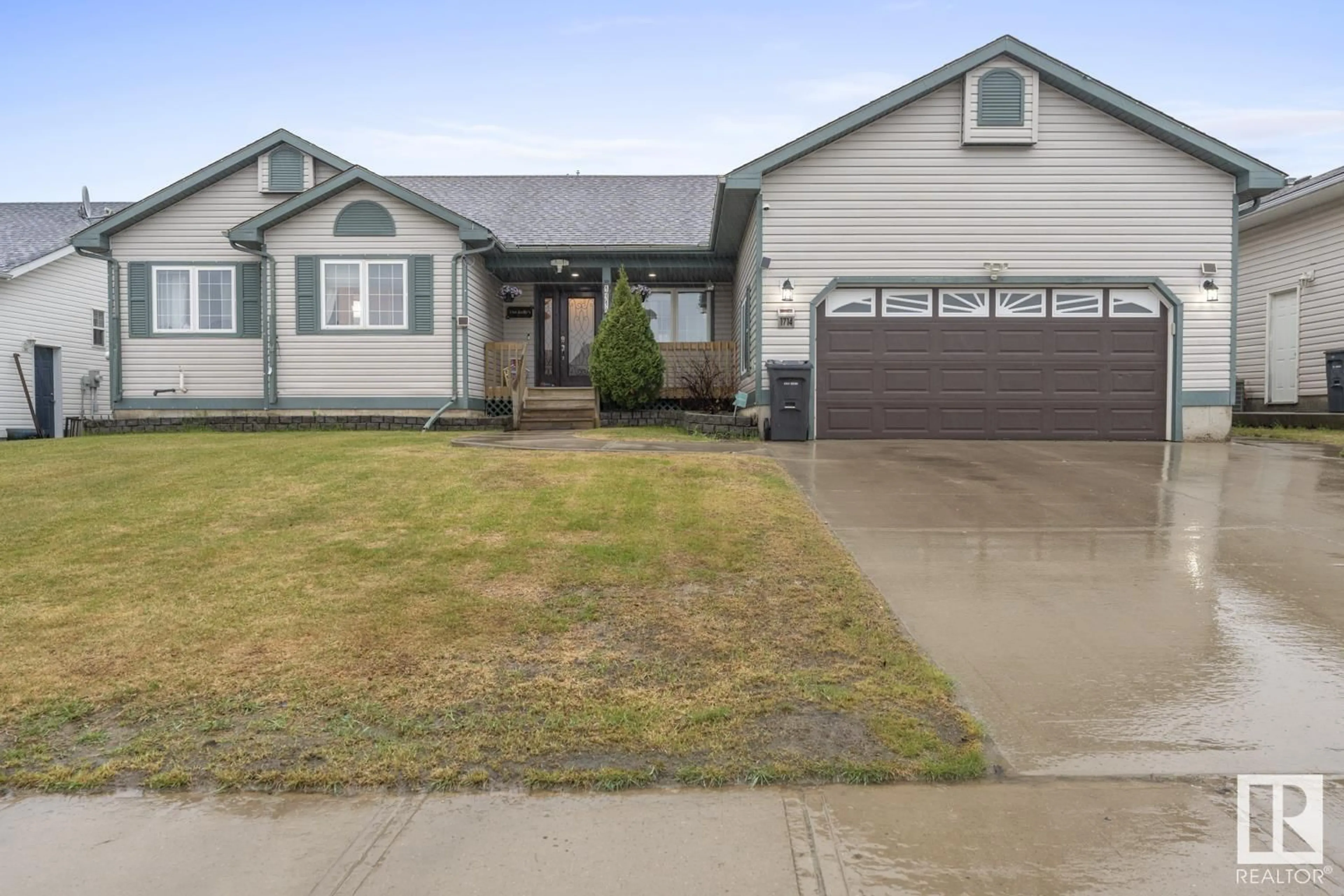 Home with vinyl exterior material, street for 1714 7 ST, Cold Lake Alberta T9M1C6