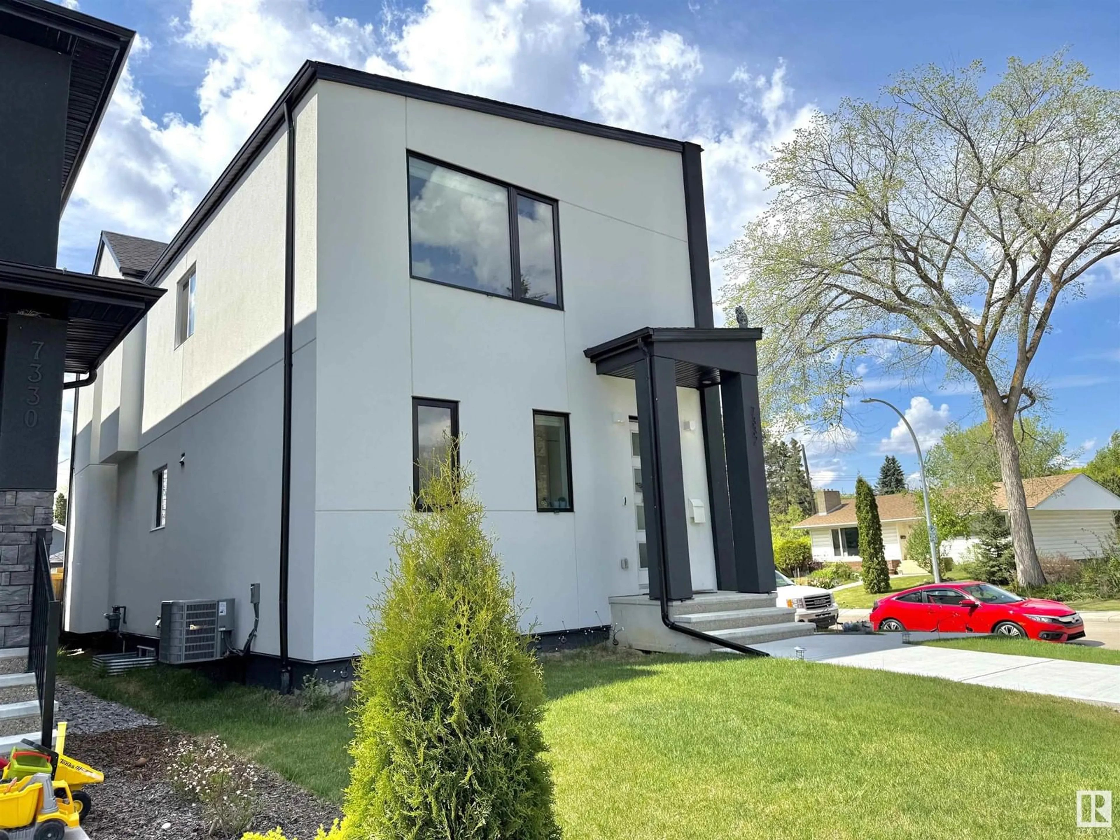 Home with vinyl exterior material, street for 7332 118 ST, Edmonton Alberta T6G1S4