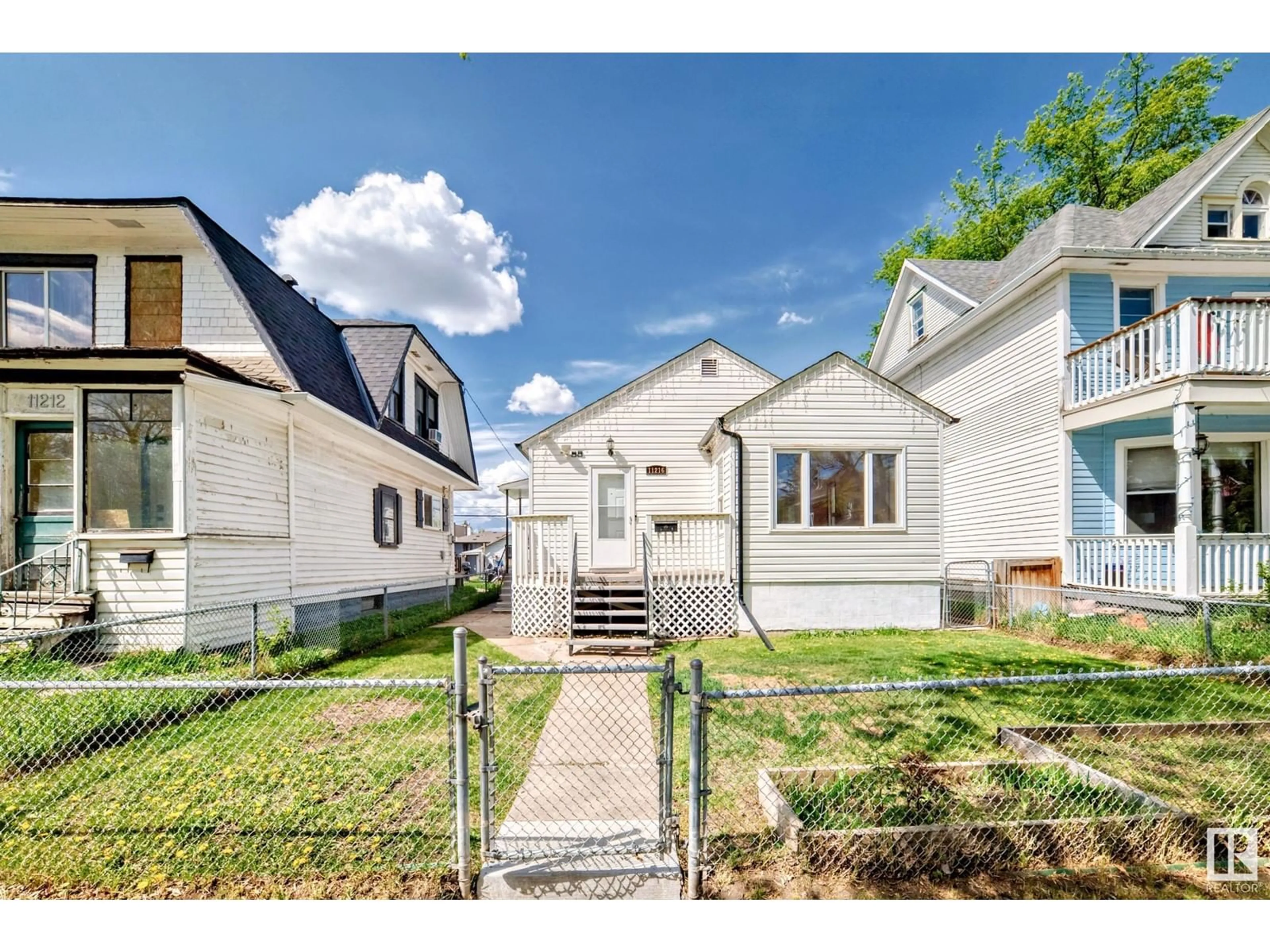 A pic from outside/outdoor area/front of a property/back of a property/a pic from drone, street for 11216 94 ST, Edmonton Alberta T5G1G9