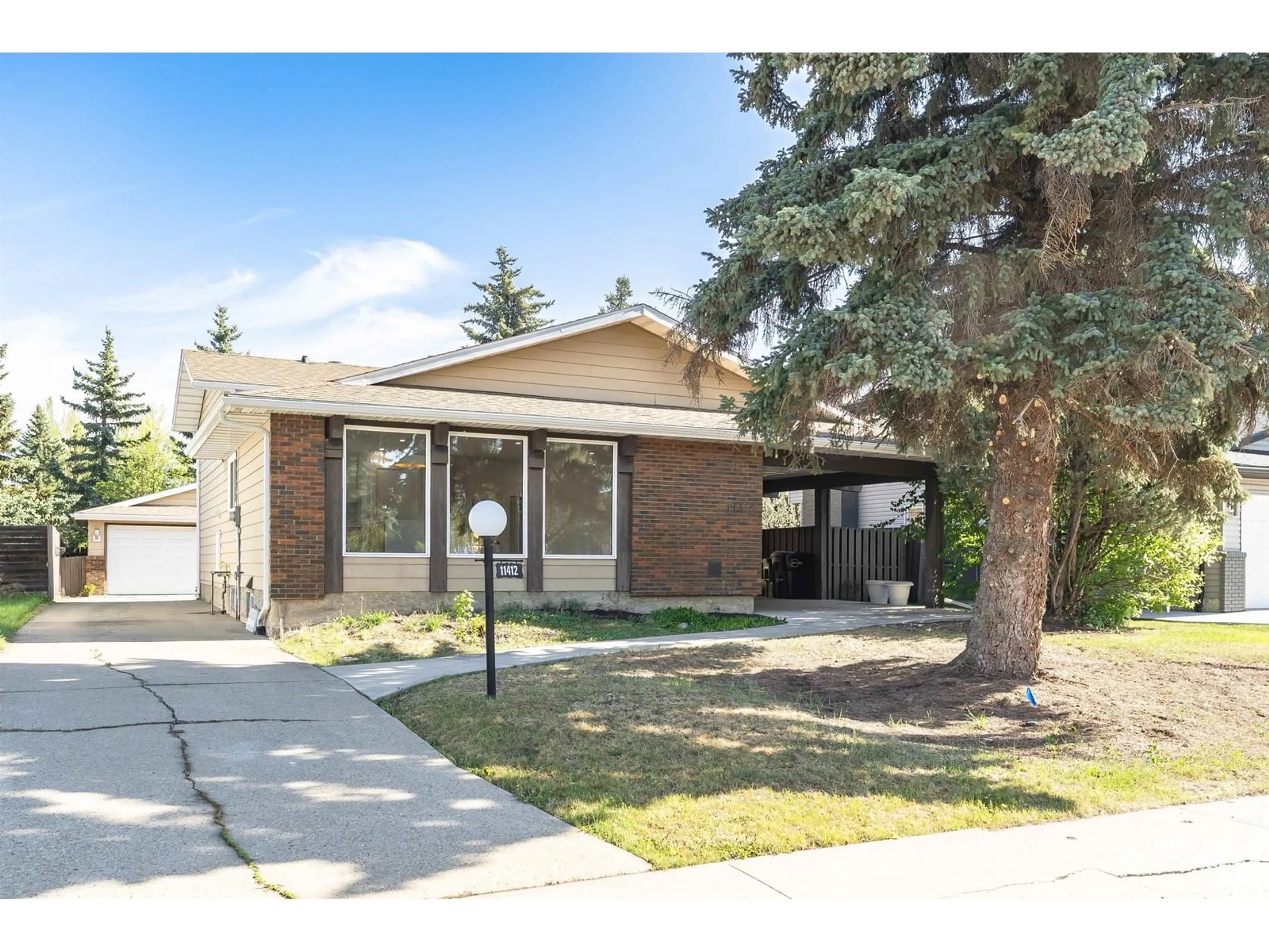Home with brick exterior material, street for 11412 33A AV, Edmonton Alberta T6J3H3