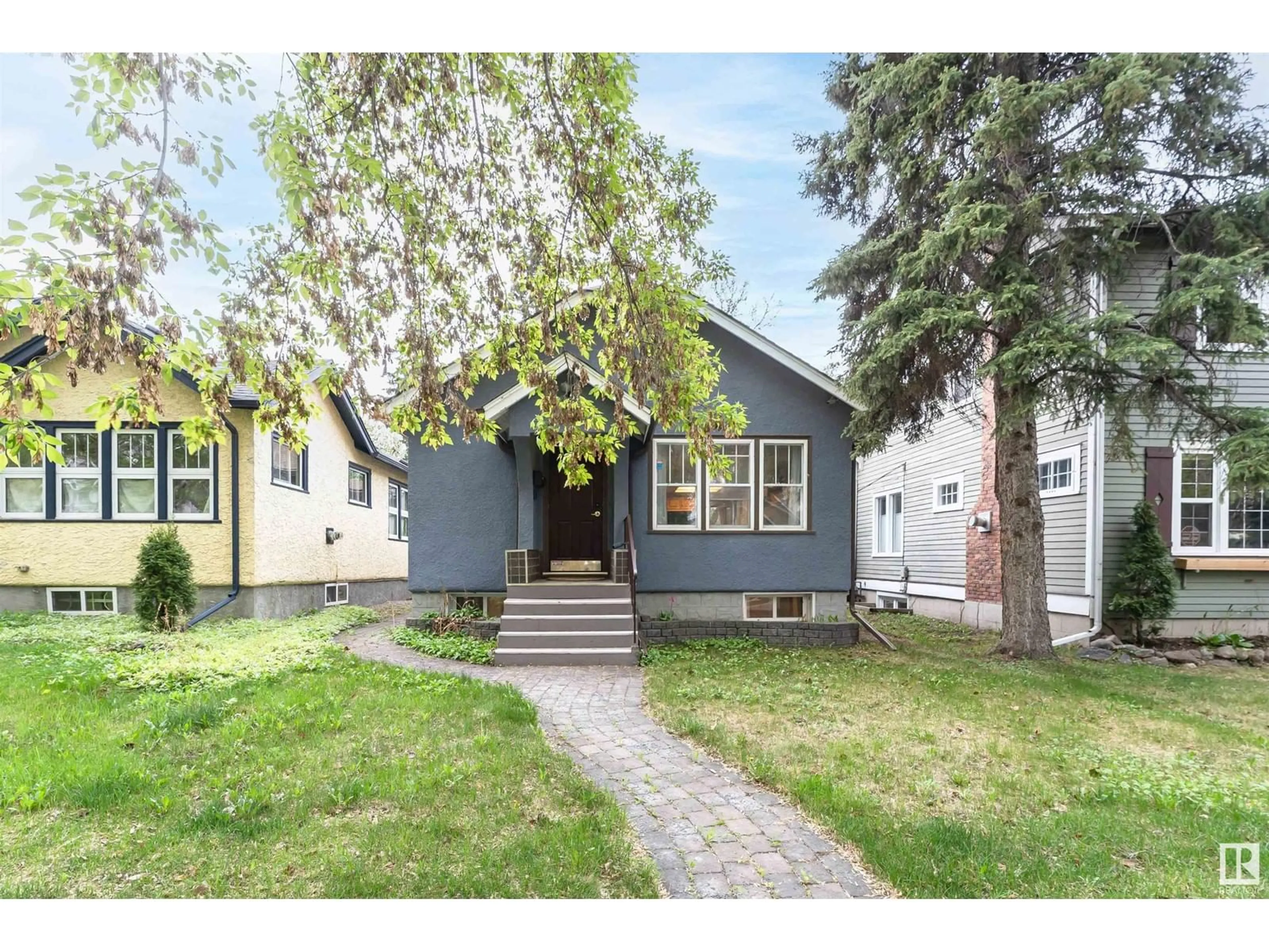 Home with vinyl exterior material, street for 11145 81 AV, Edmonton Alberta T6G0S6