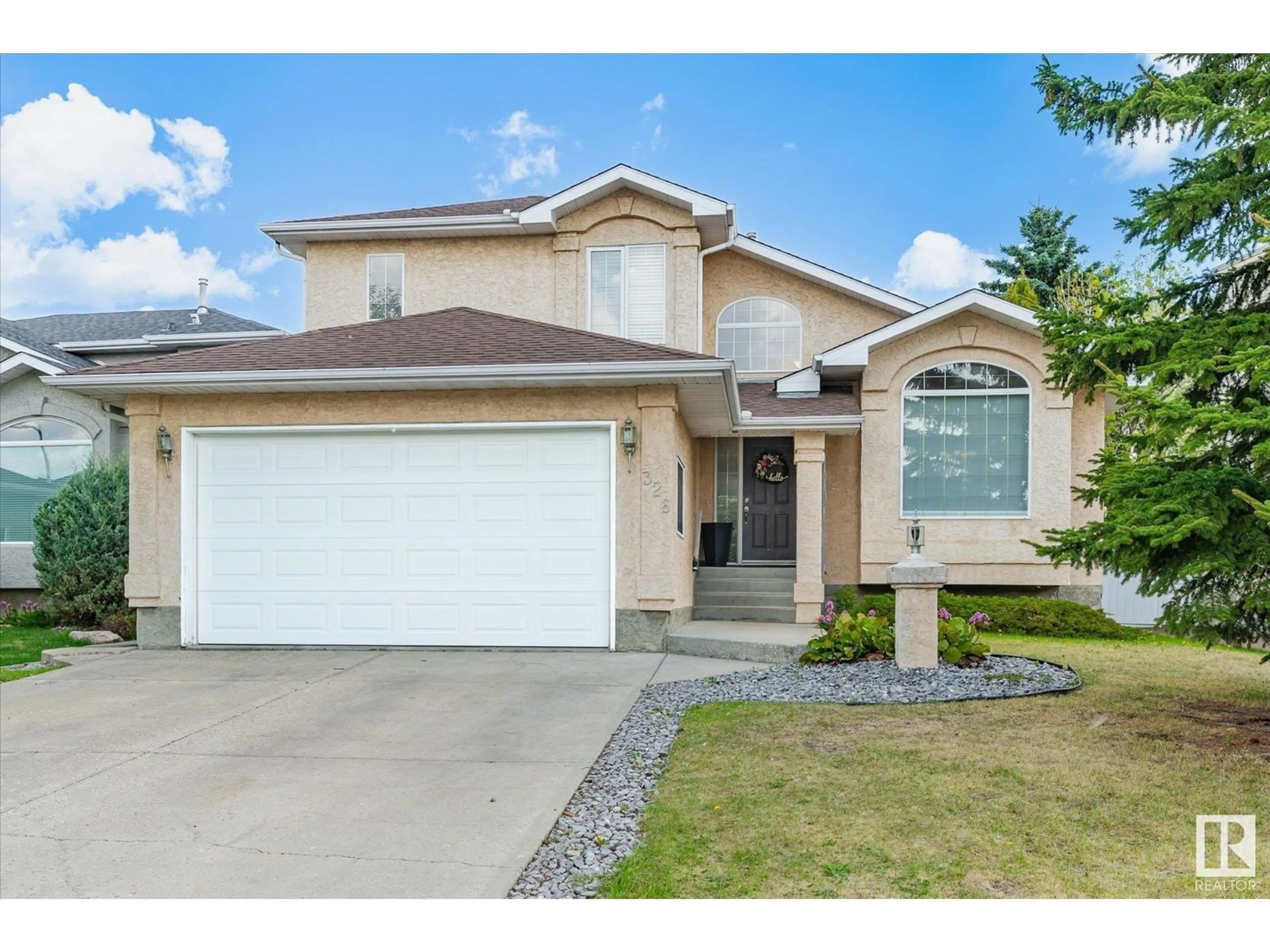 Home with vinyl exterior material, street for 326 HOLLICK-KENYON RD, Edmonton Alberta T5Y2T4