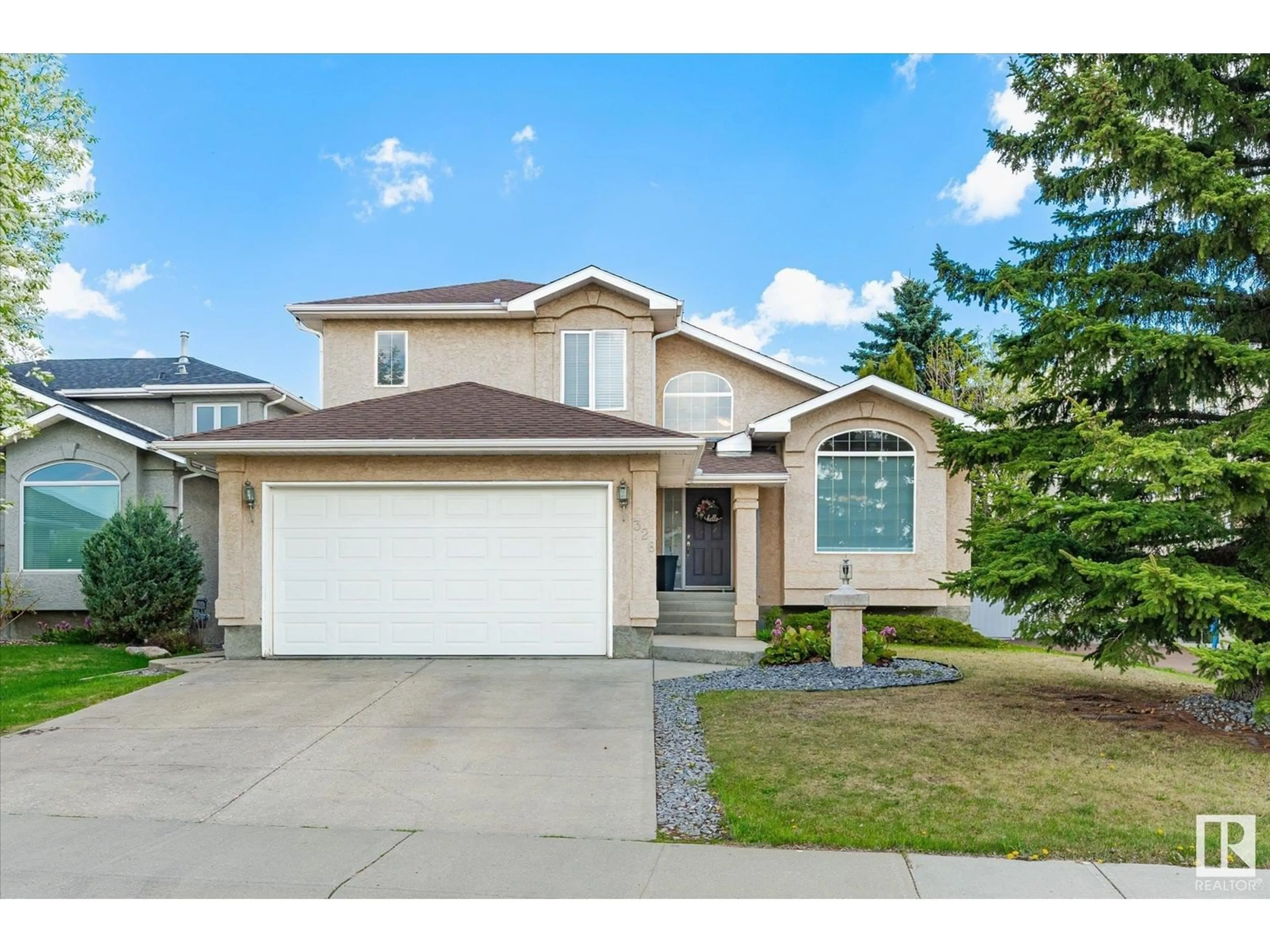 Home with vinyl exterior material, street for 326 HOLLICK-KENYON RD, Edmonton Alberta T5Y2T4