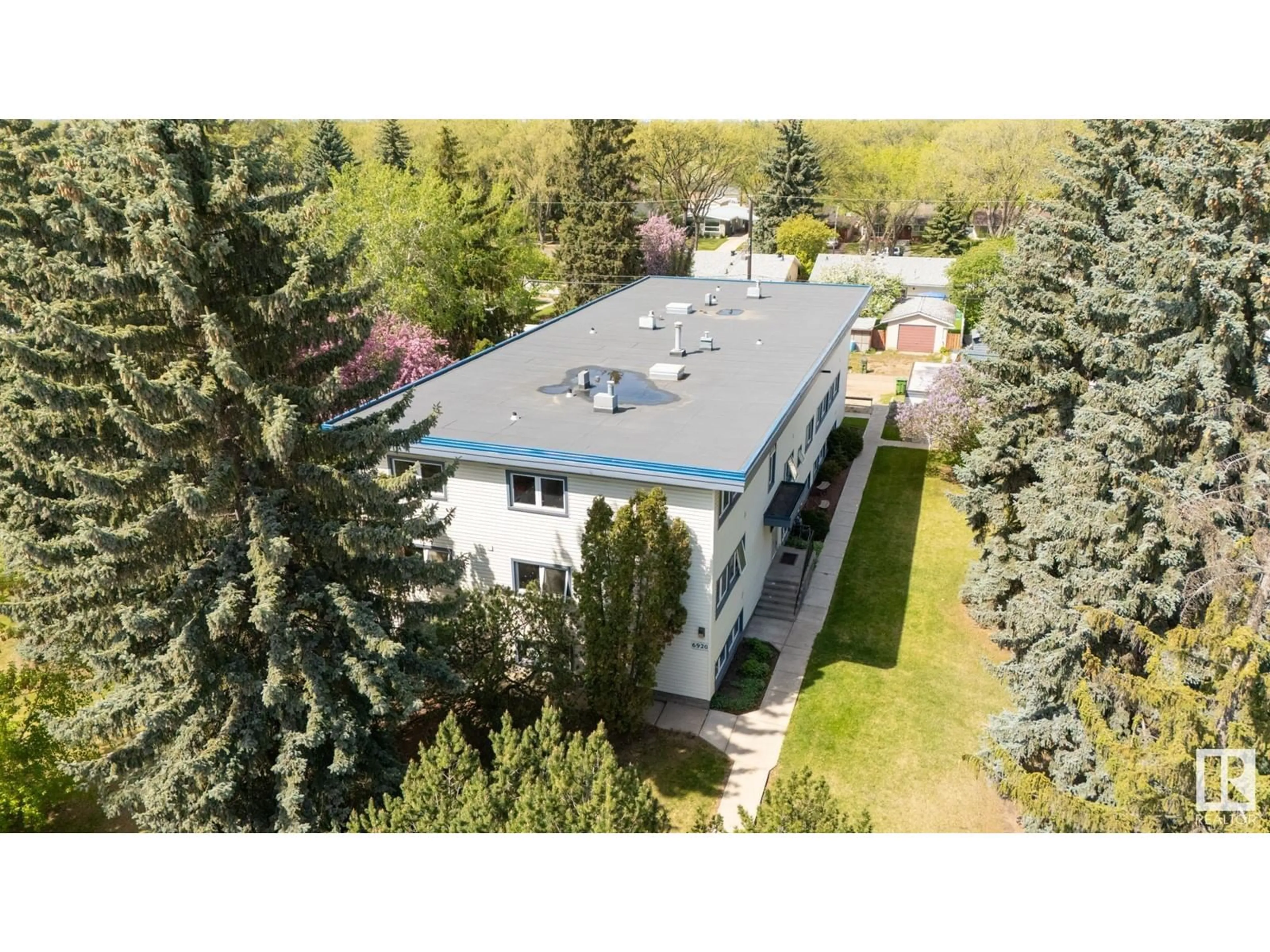 A pic from outside/outdoor area/front of a property/back of a property/a pic from drone, unknown for #9 - 6920 101 AV, Edmonton Alberta T6A0H7