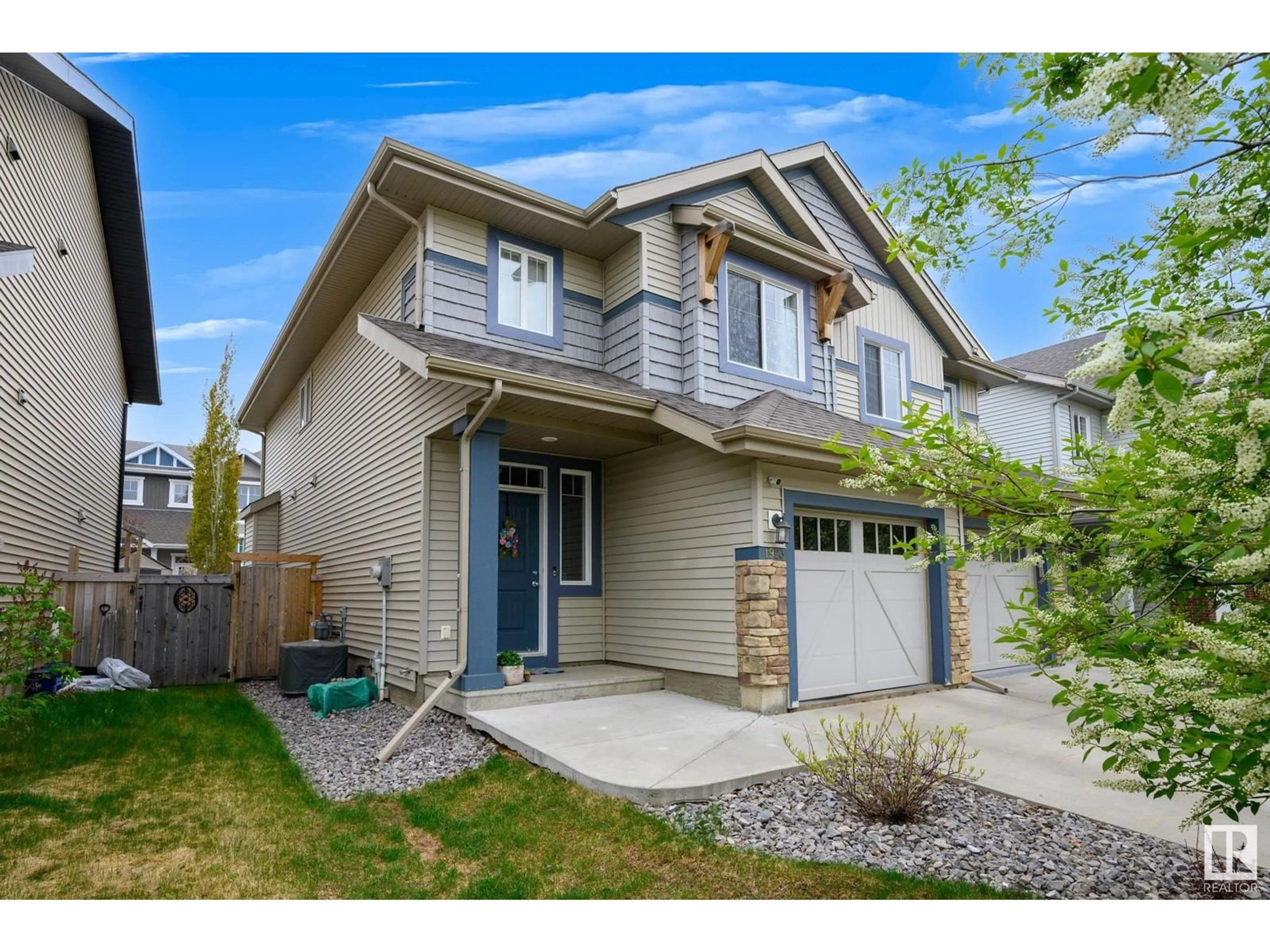 Home with vinyl exterior material, street for 1923 CHAPMAN RD, Edmonton Alberta T6W0Y7