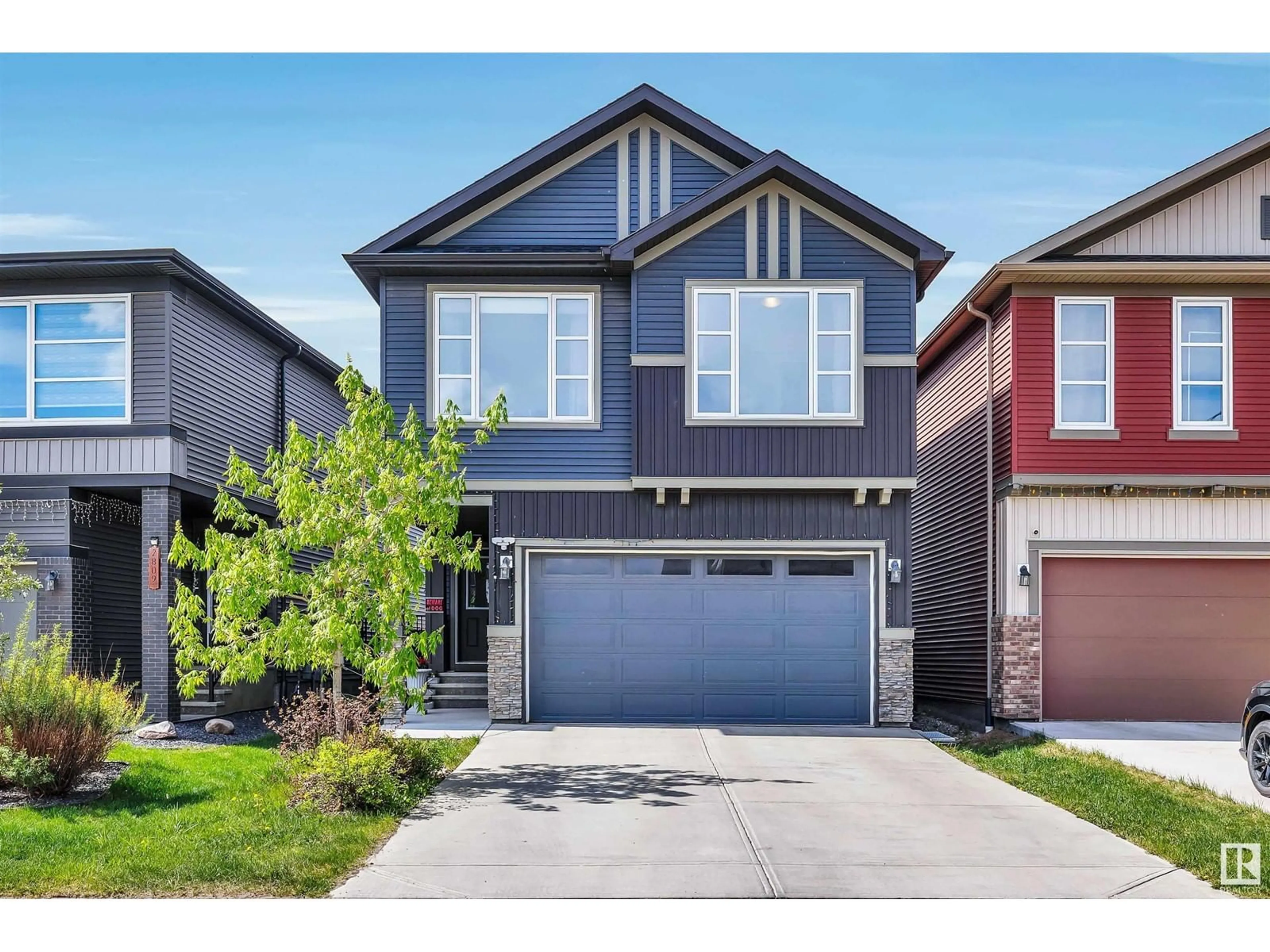 Home with vinyl exterior material, street for 2807 COLLINS CR, Edmonton Alberta T6W4G8
