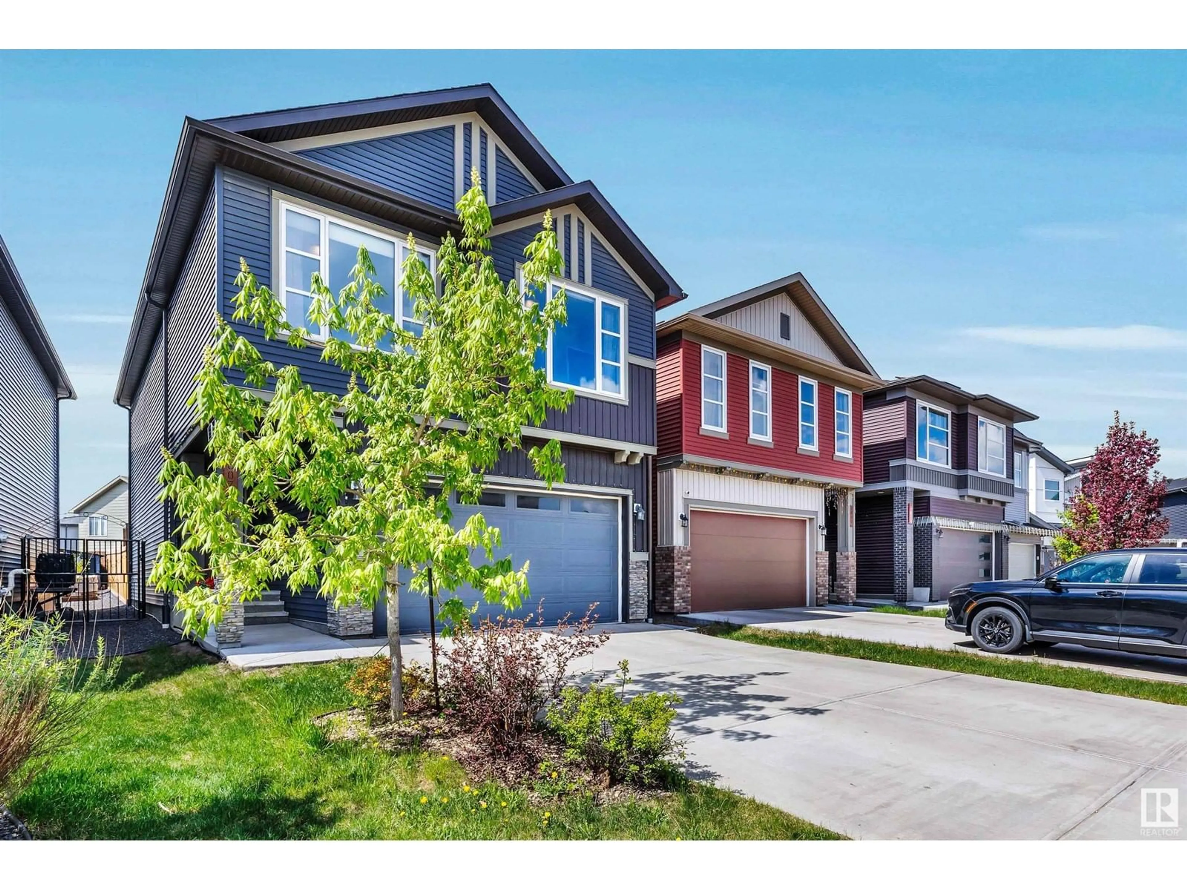 Home with vinyl exterior material, street for 2807 COLLINS CR, Edmonton Alberta T6W4G8
