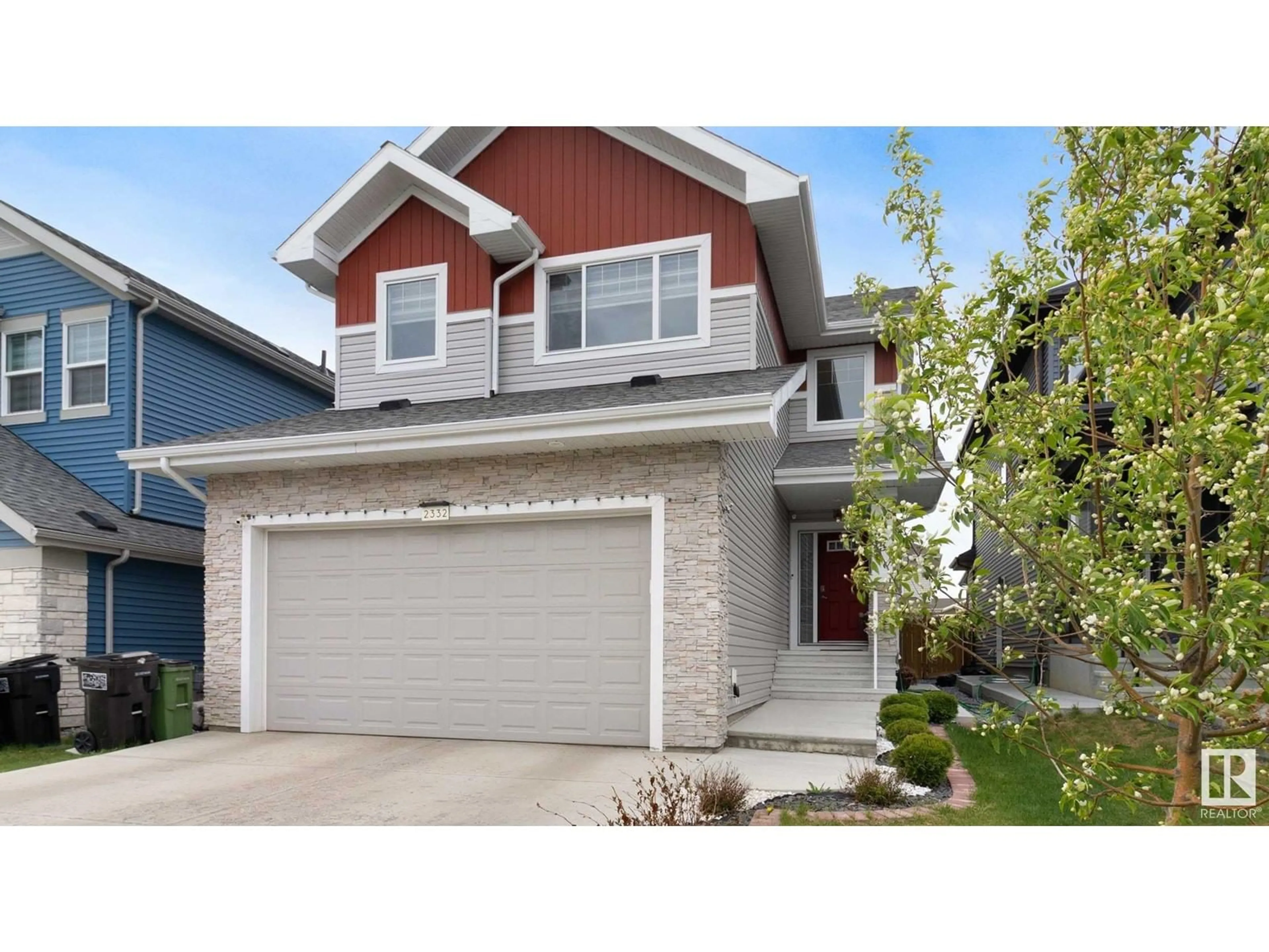 Home with vinyl exterior material, street for 2332 53 ST, Edmonton Alberta T6X2X3