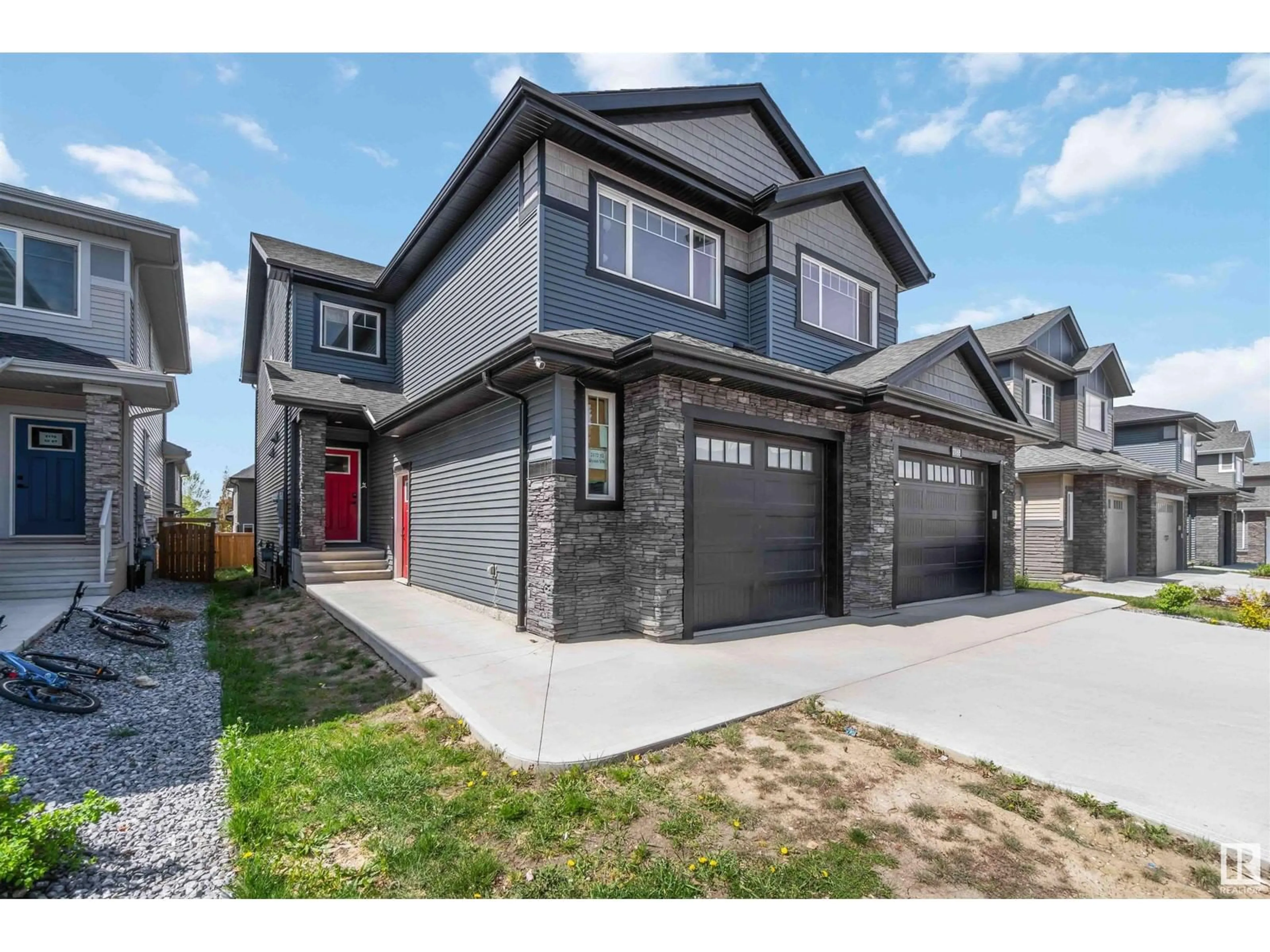 Home with brick exterior material, street for 2172 52 ST, Edmonton Alberta T6X1Z7