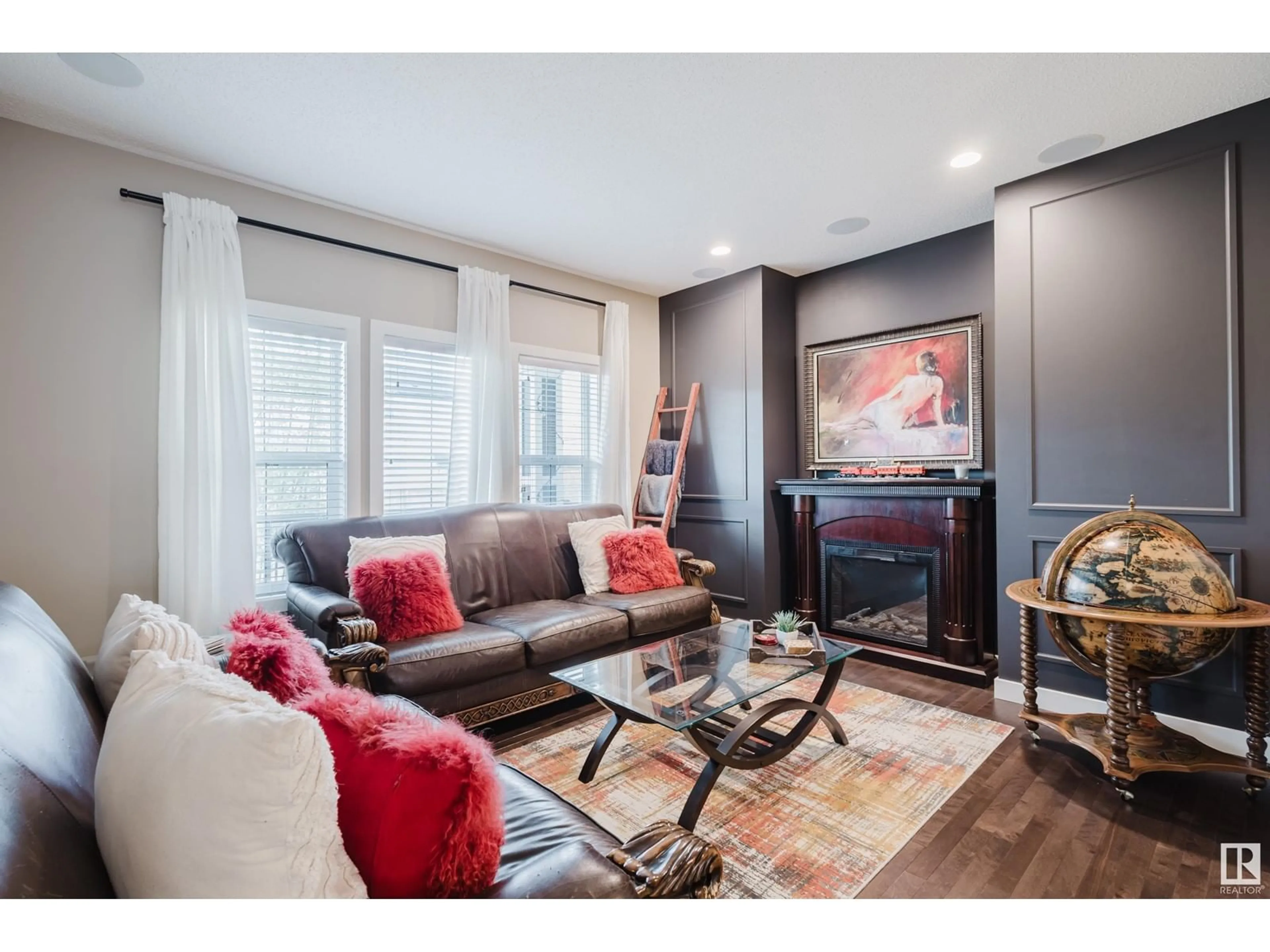 Living room with furniture, wood/laminate floor for 1525 SECORD RD, Edmonton Alberta T5T7B4
