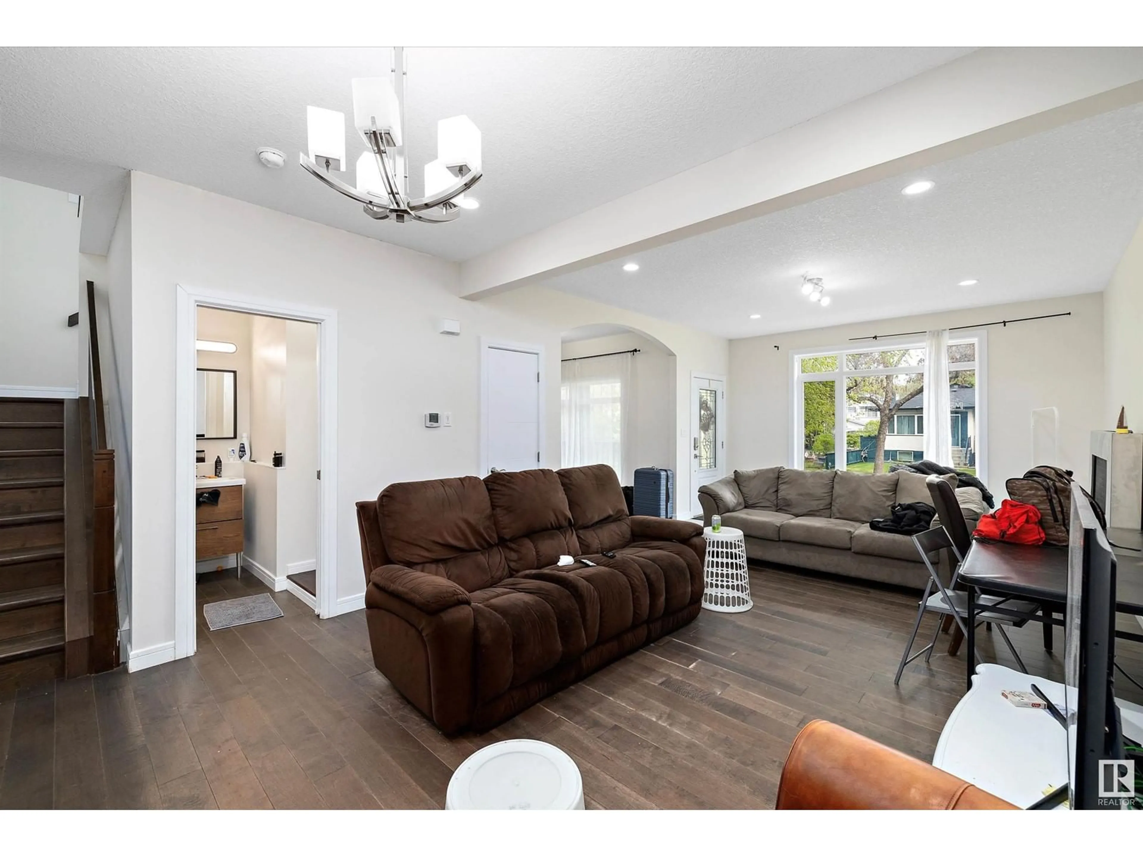 Living room with furniture, unknown for 10717 76 AV, Edmonton Alberta T6E1L8