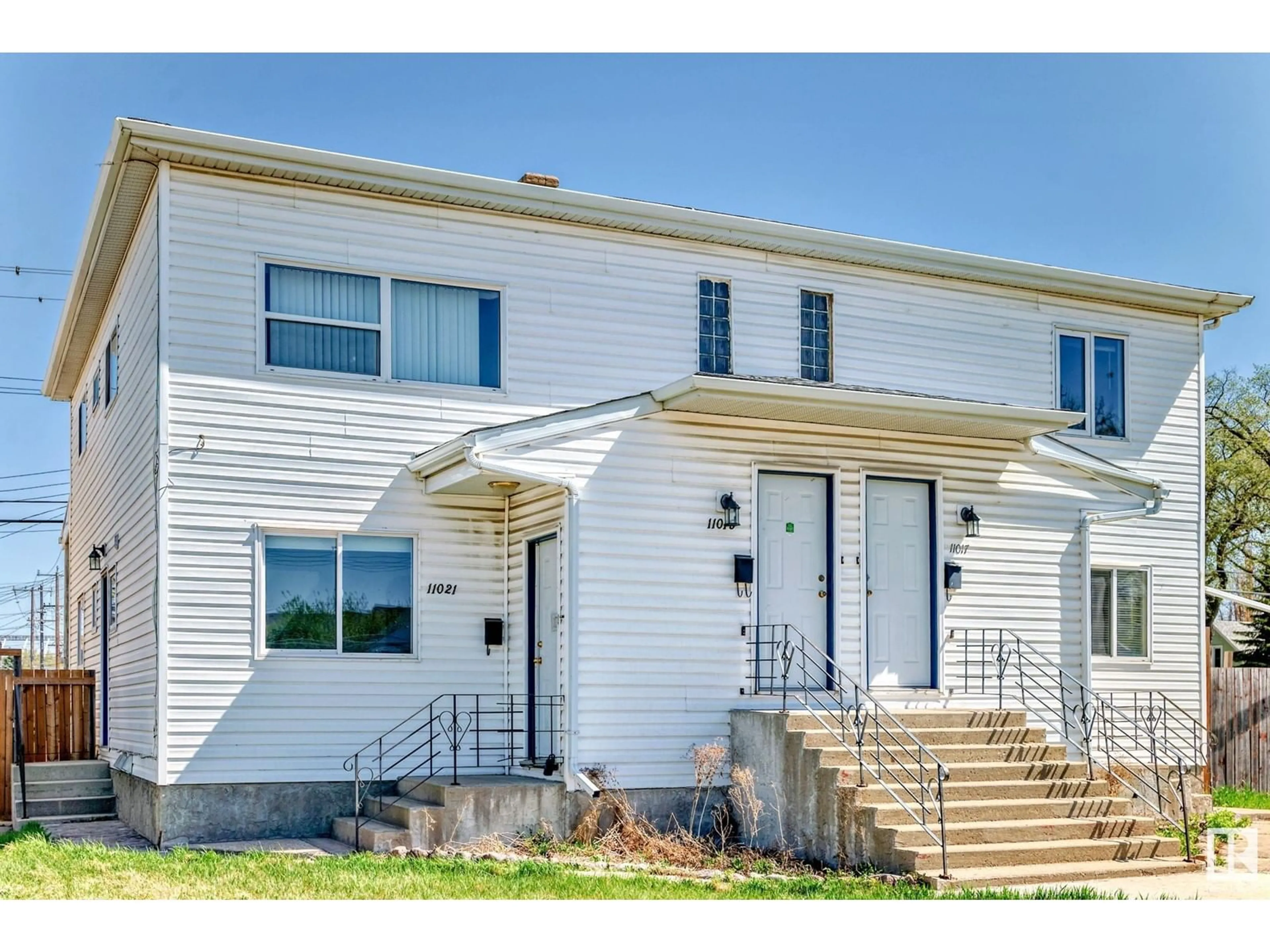 Home with vinyl exterior material, street for 11015 96 ST, Edmonton Alberta T5H2K7