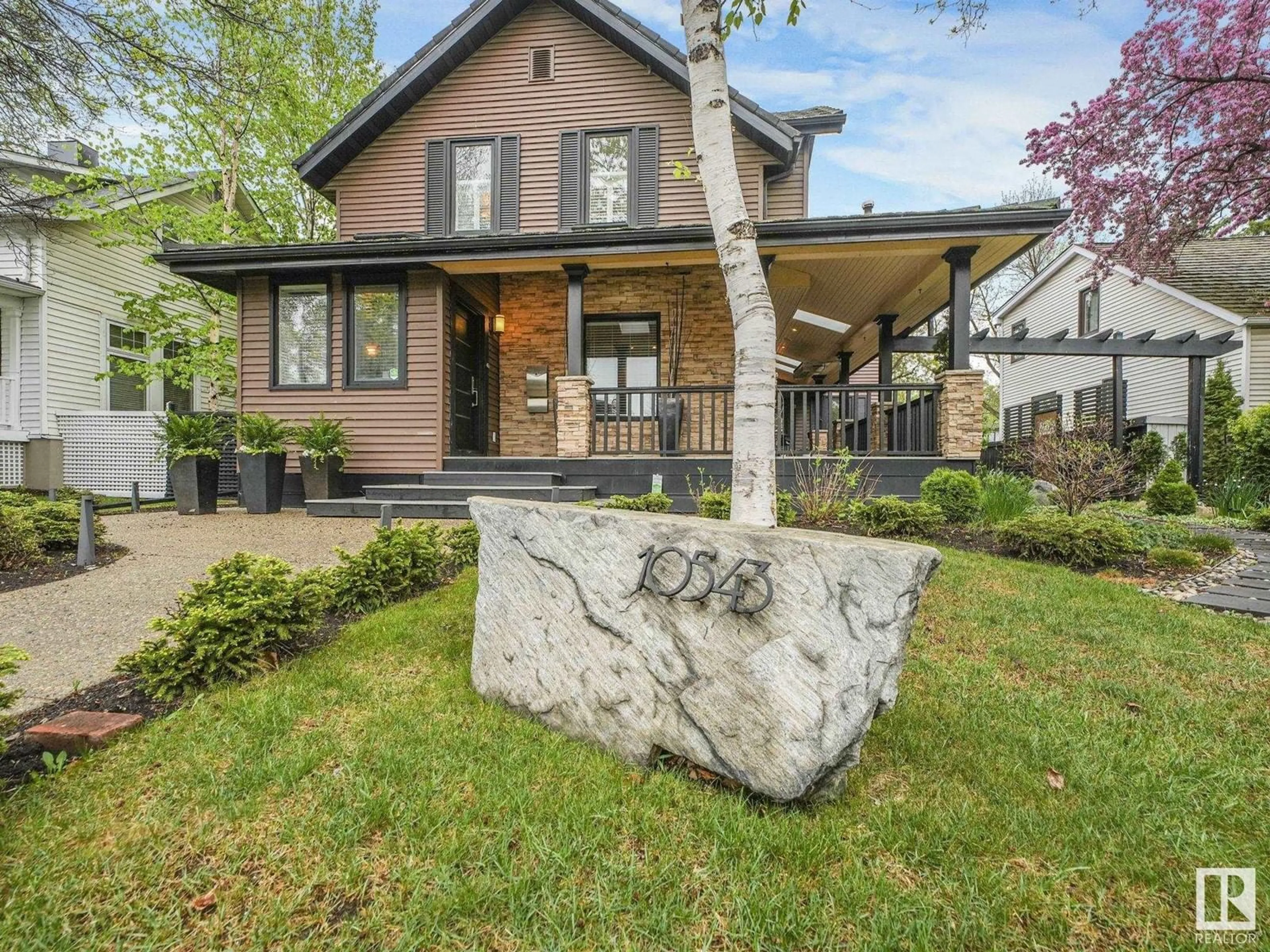 Home with brick exterior material, mountain view for 10543 130 ST, Edmonton Alberta T5N1X9