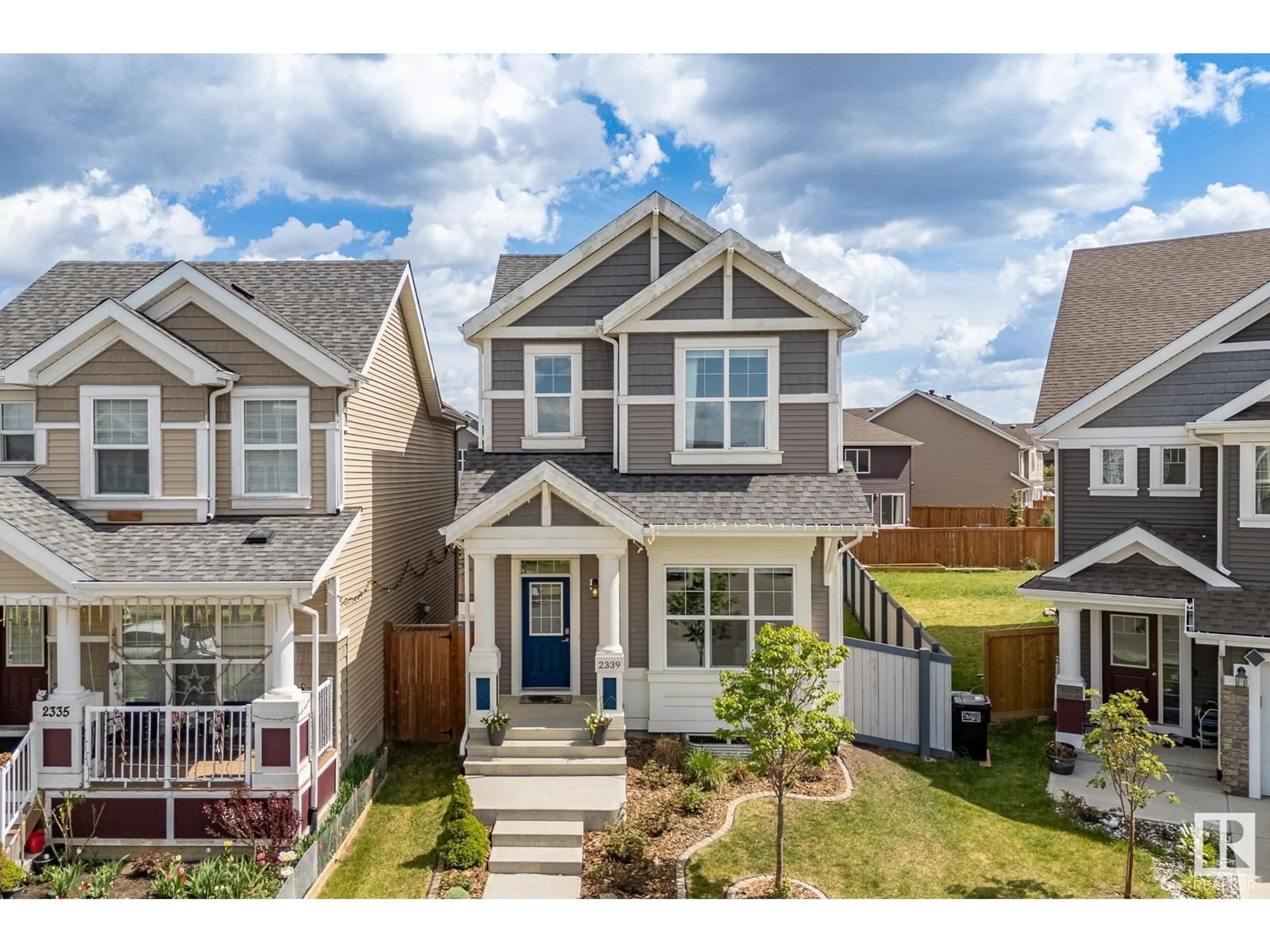 Home with vinyl exterior material, street for 2339 84 ST, Edmonton Alberta T6X2G1