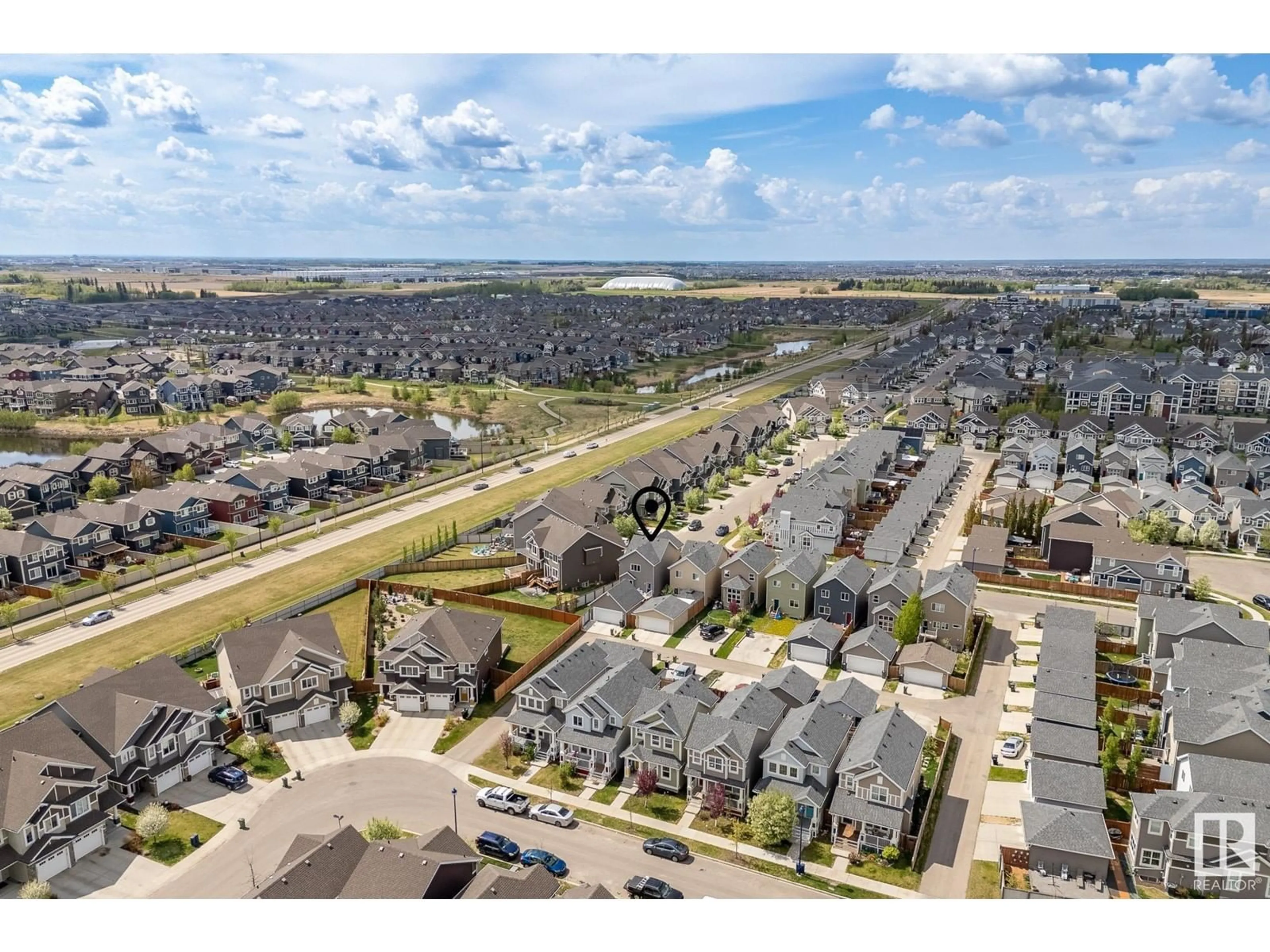A pic from outside/outdoor area/front of a property/back of a property/a pic from drone, street for 2339 84 ST, Edmonton Alberta T6X2G1