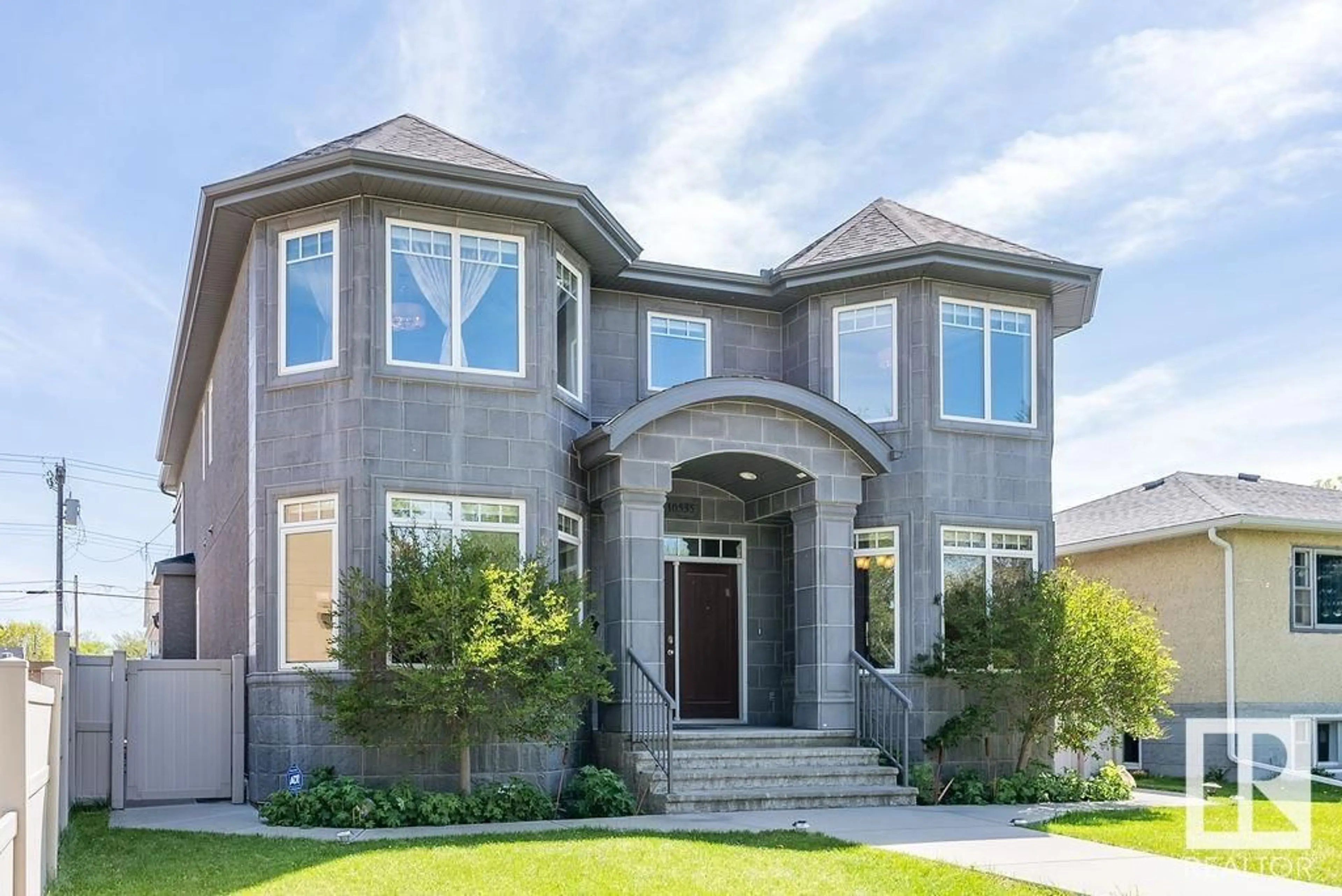 Home with brick exterior material, street for NW - 10535 80 ST, Edmonton Alberta T6A3J8