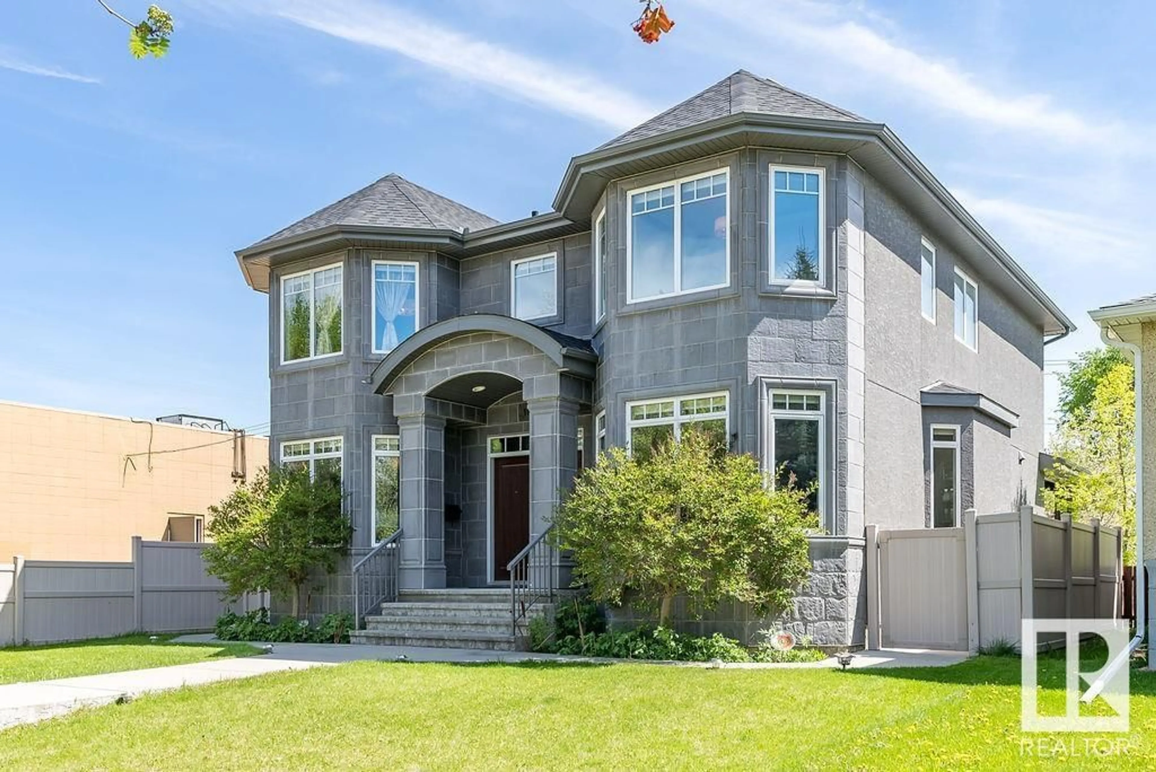 Home with brick exterior material, street for NW - 10535 80 ST, Edmonton Alberta T6A3J8