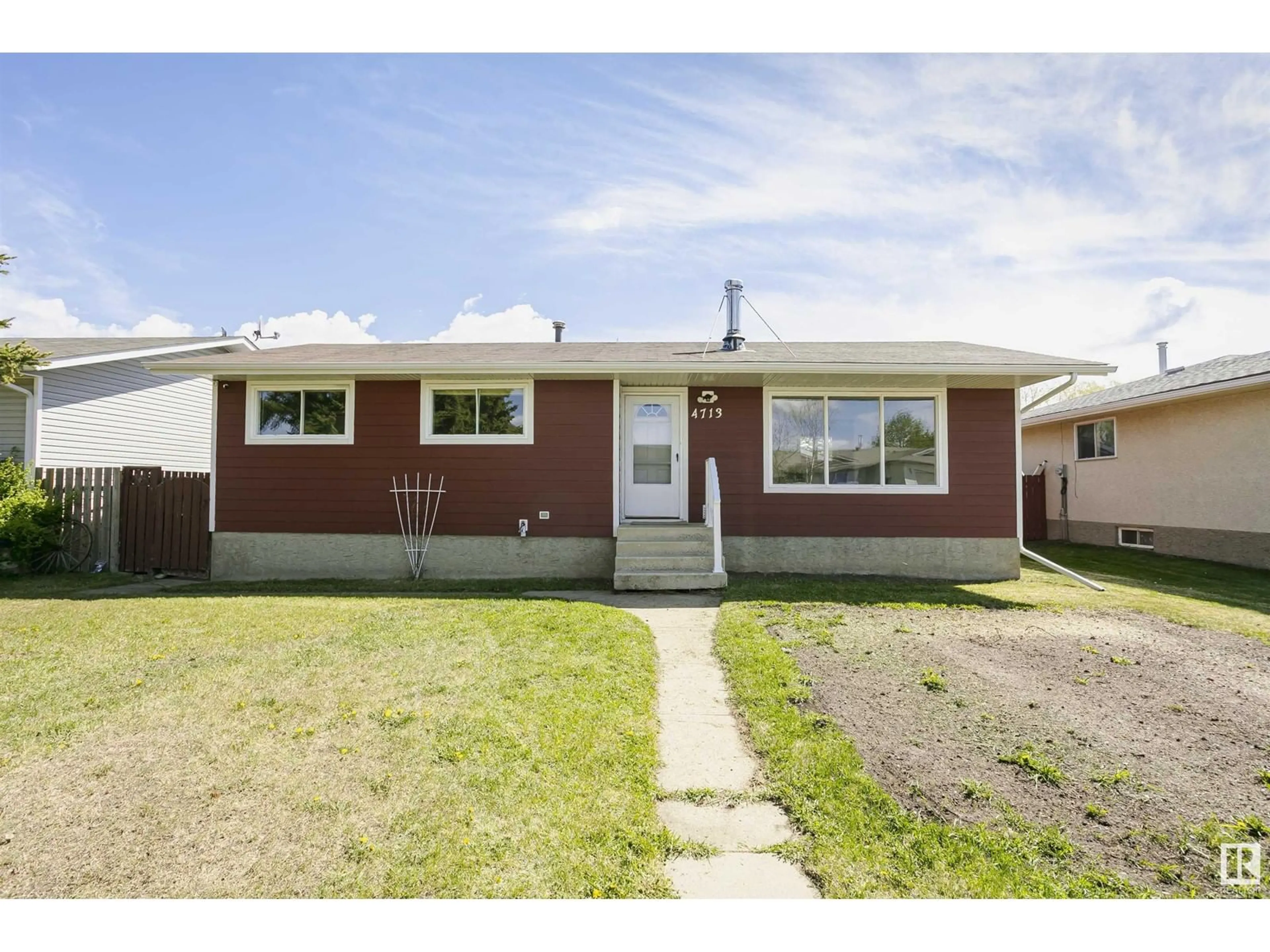 Home with vinyl exterior material, street for 4713 51 ST, Legal Alberta T0G1B0