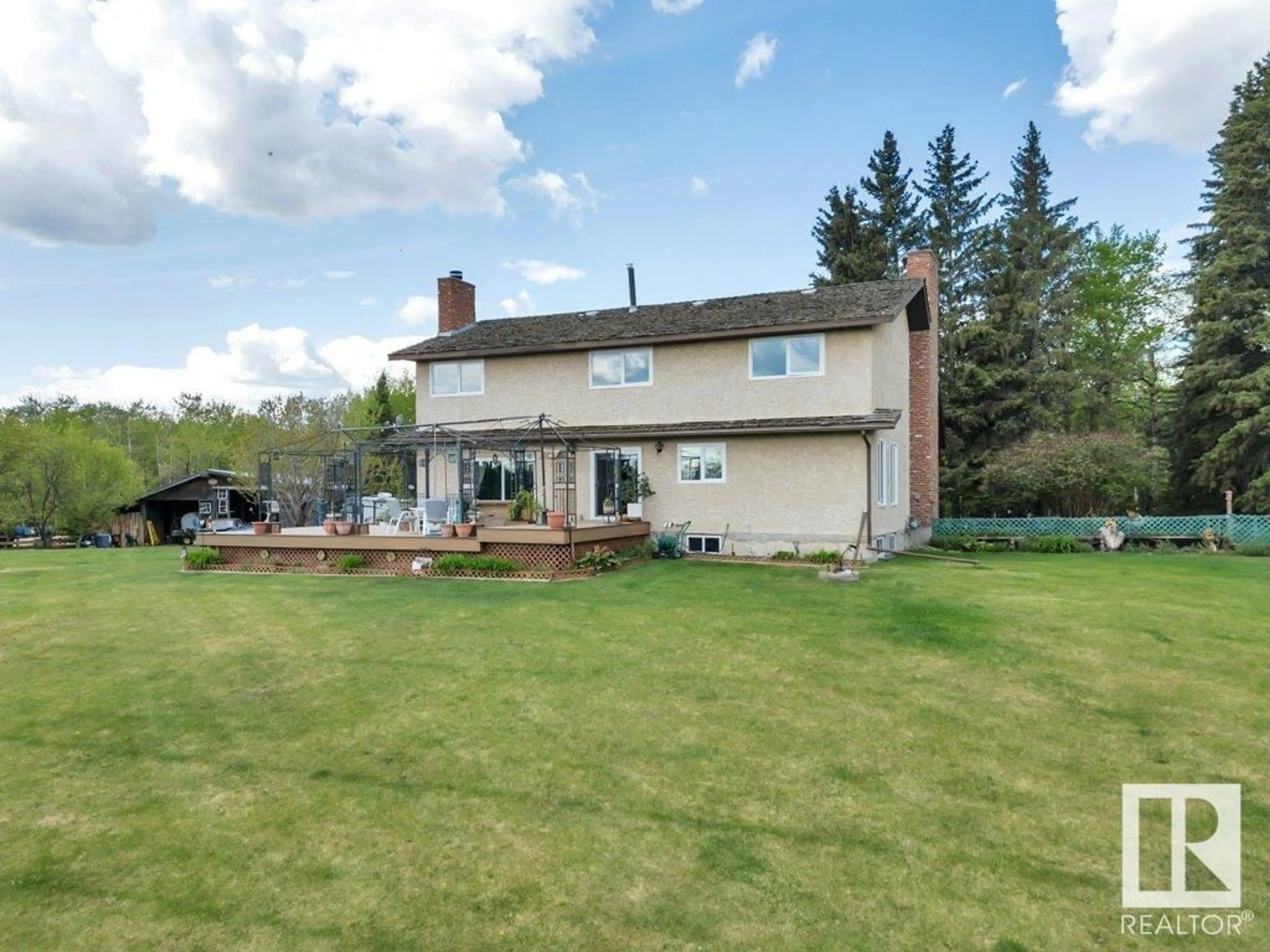 A pic from outside/outdoor area/front of a property/back of a property/a pic from drone, unknown for 20239 TWP ROAD 515, Rural Strathcona County Alberta T8G1G2