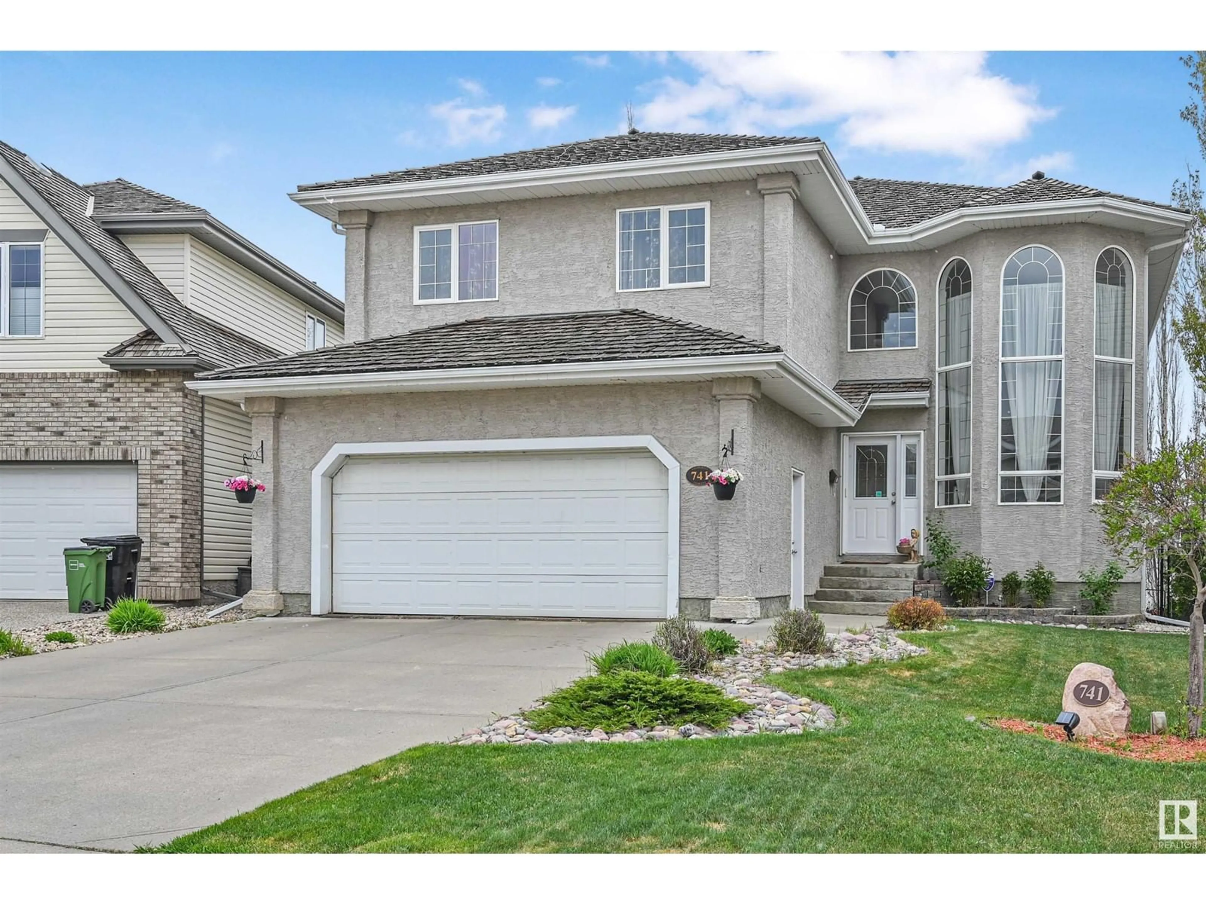 Home with vinyl exterior material, street for 741 HALIBURTON CR, Edmonton Alberta T6R2Z7