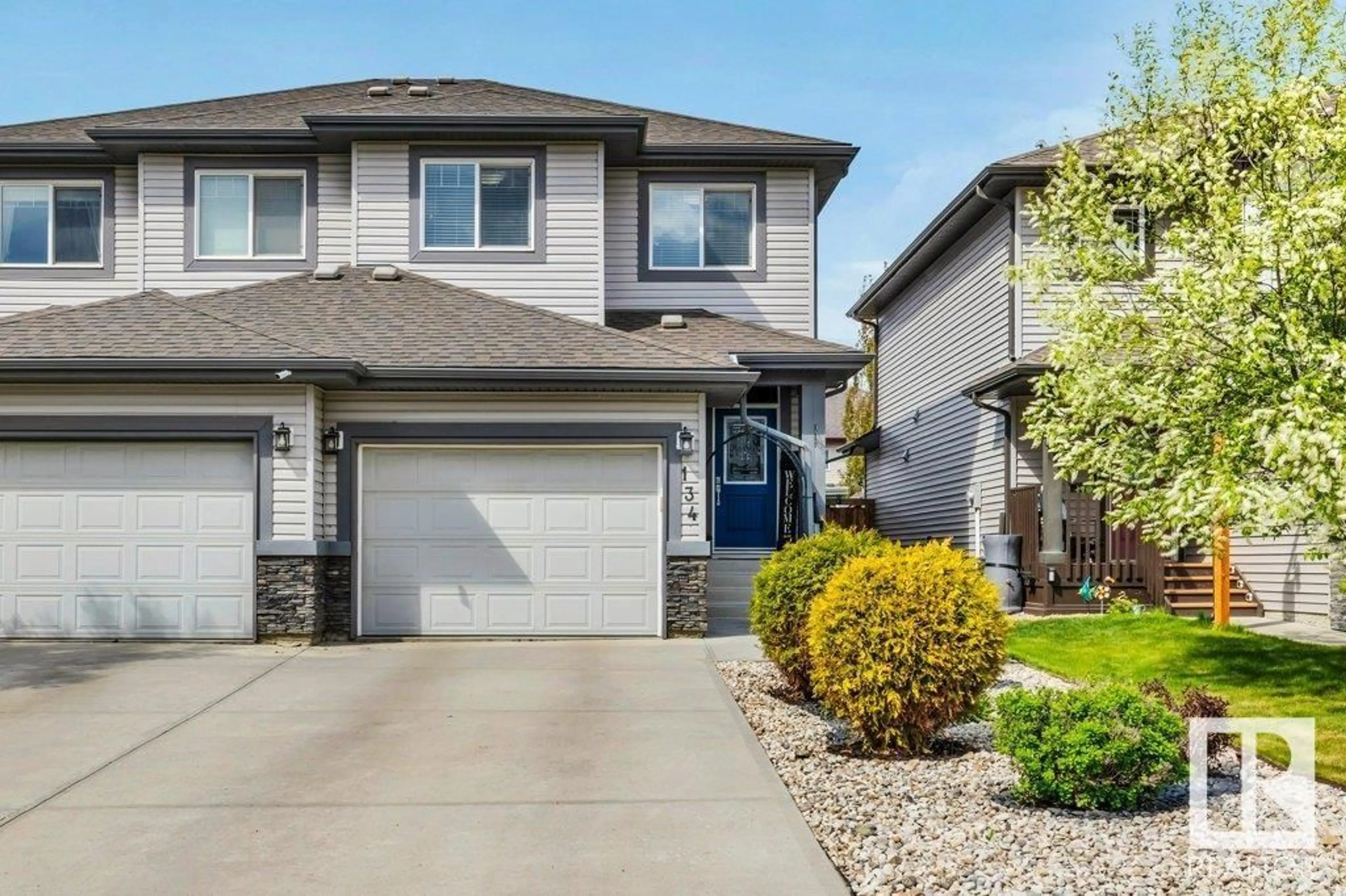 Home with vinyl exterior material, street for 134 SPRINGWOOD WY, Spruce Grove Alberta T7X0S9