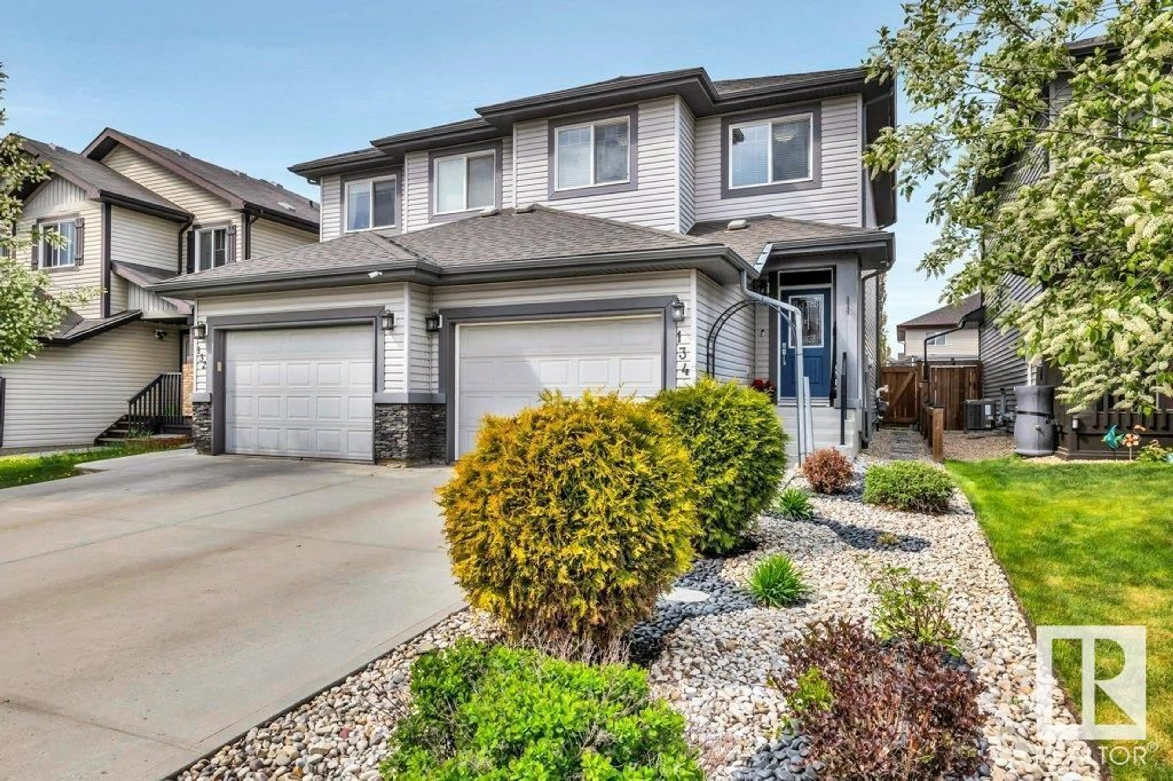 Home with vinyl exterior material, street for 134 SPRINGWOOD WY, Spruce Grove Alberta T7X0S9