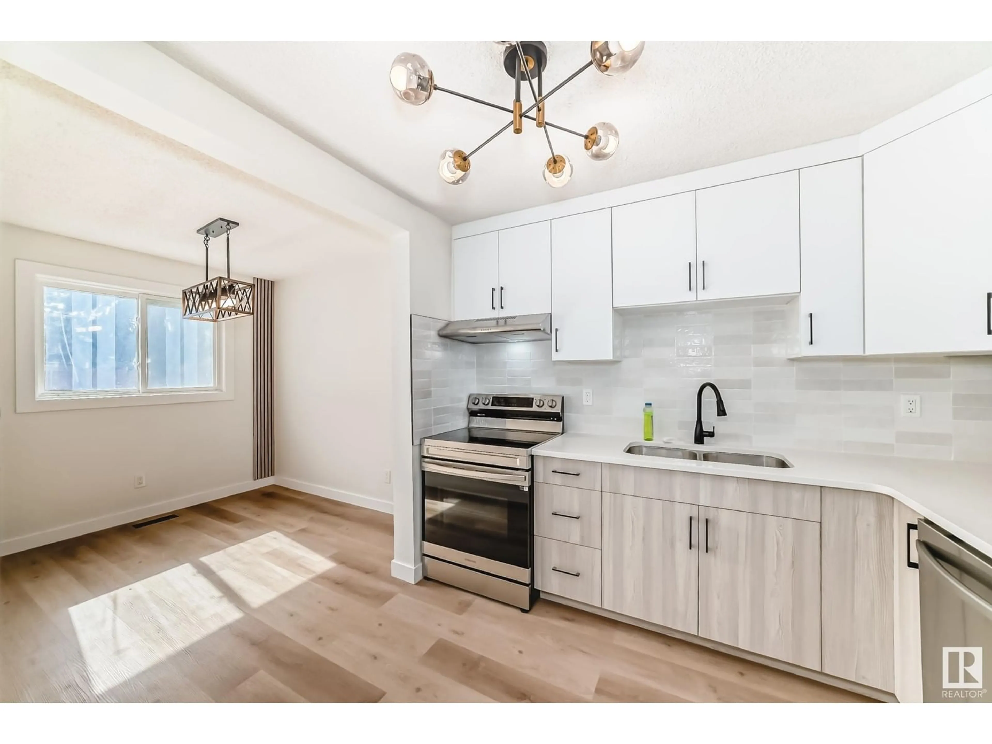 Open concept kitchen, unknown for 14233 23 ST, Edmonton Alberta T5Y1E8