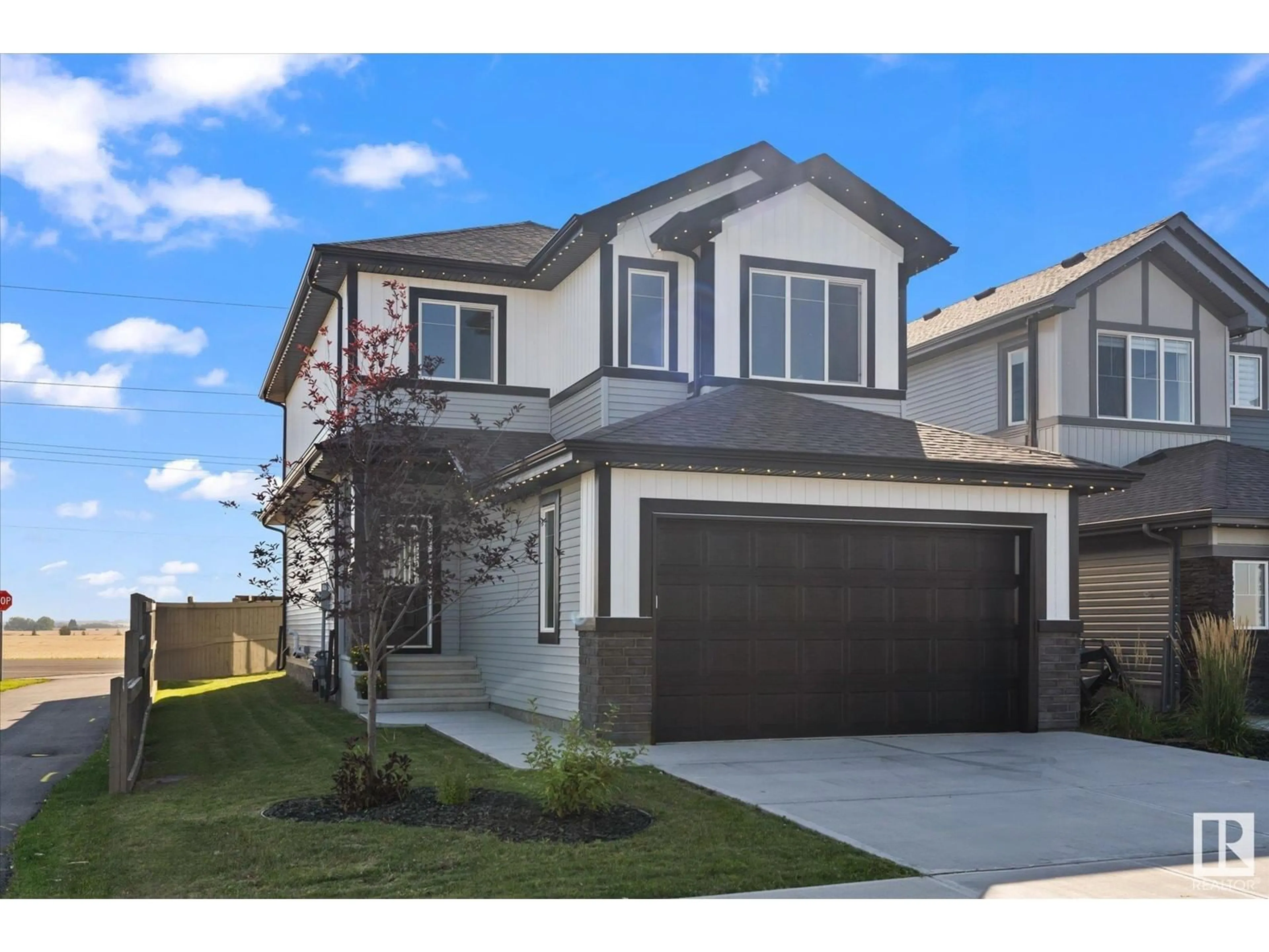 Home with vinyl exterior material, street for 1 CLAYSTONE WY, Fort Saskatchewan Alberta T8L0Z1