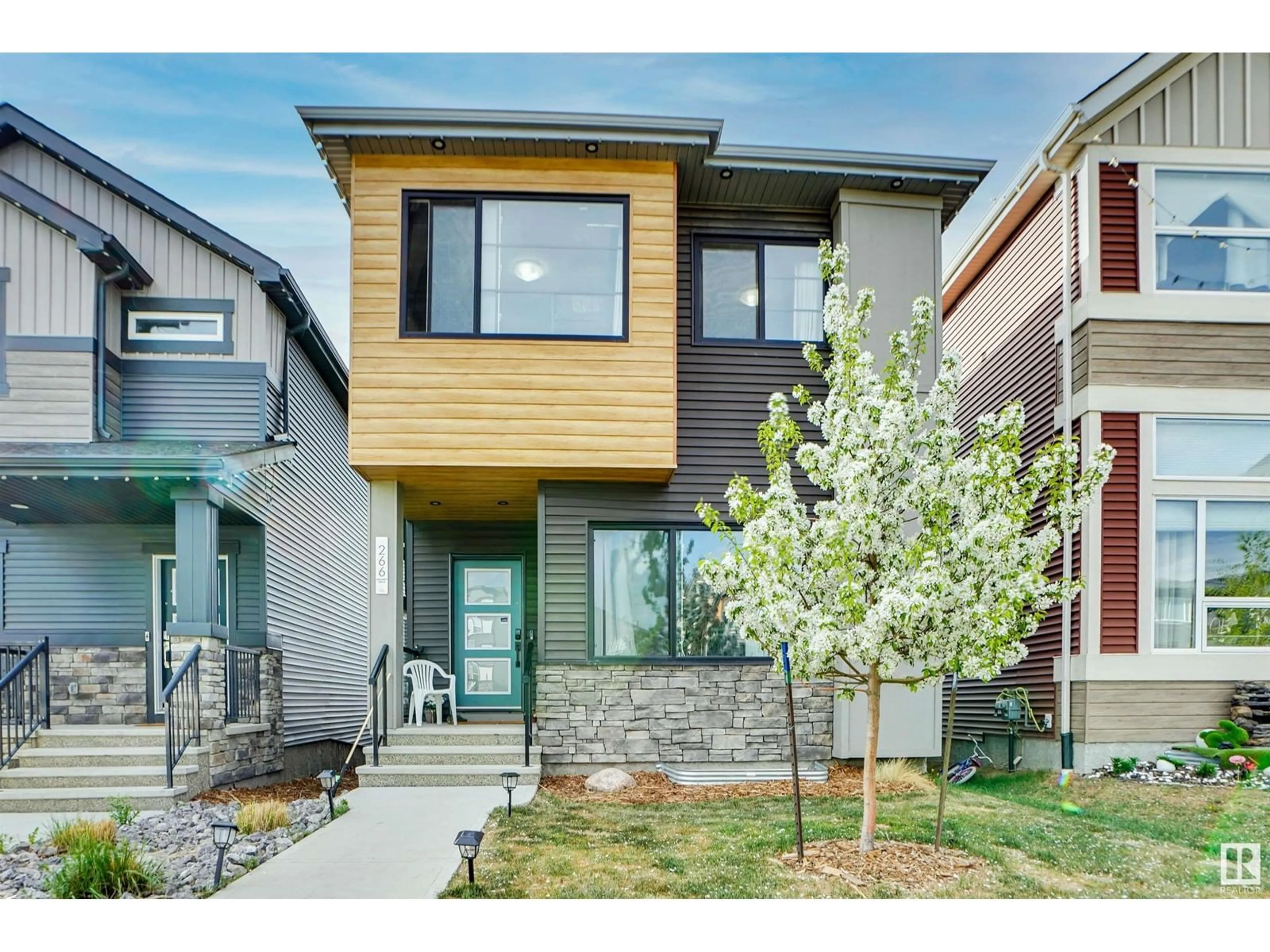 Home with brick exterior material, street for 266 CHARLESWORTH DR, Edmonton Alberta T6X2P4