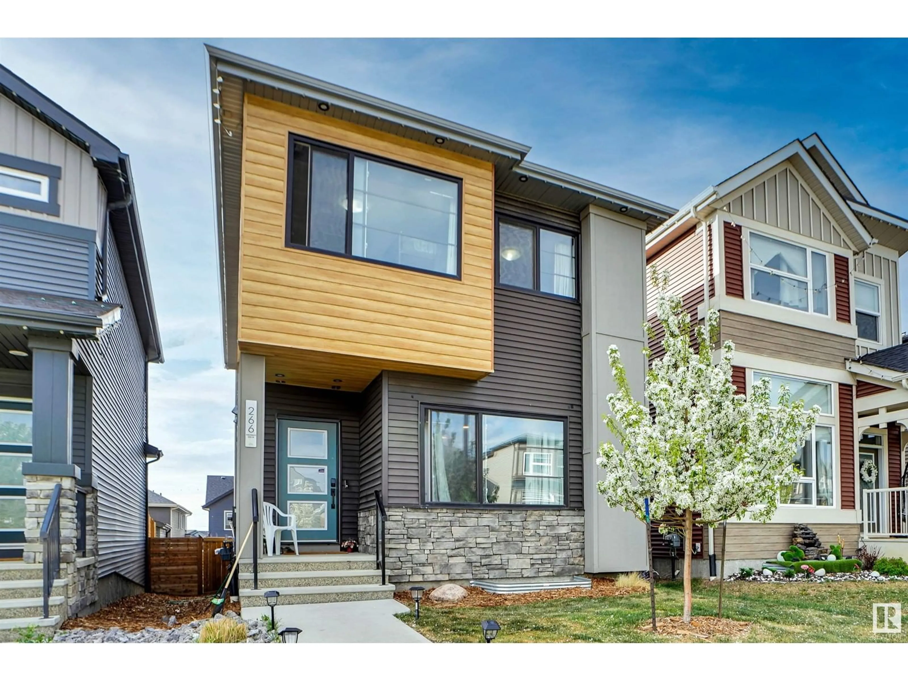 Home with vinyl exterior material, street for 266 CHARLESWORTH DR, Edmonton Alberta T6X2P4