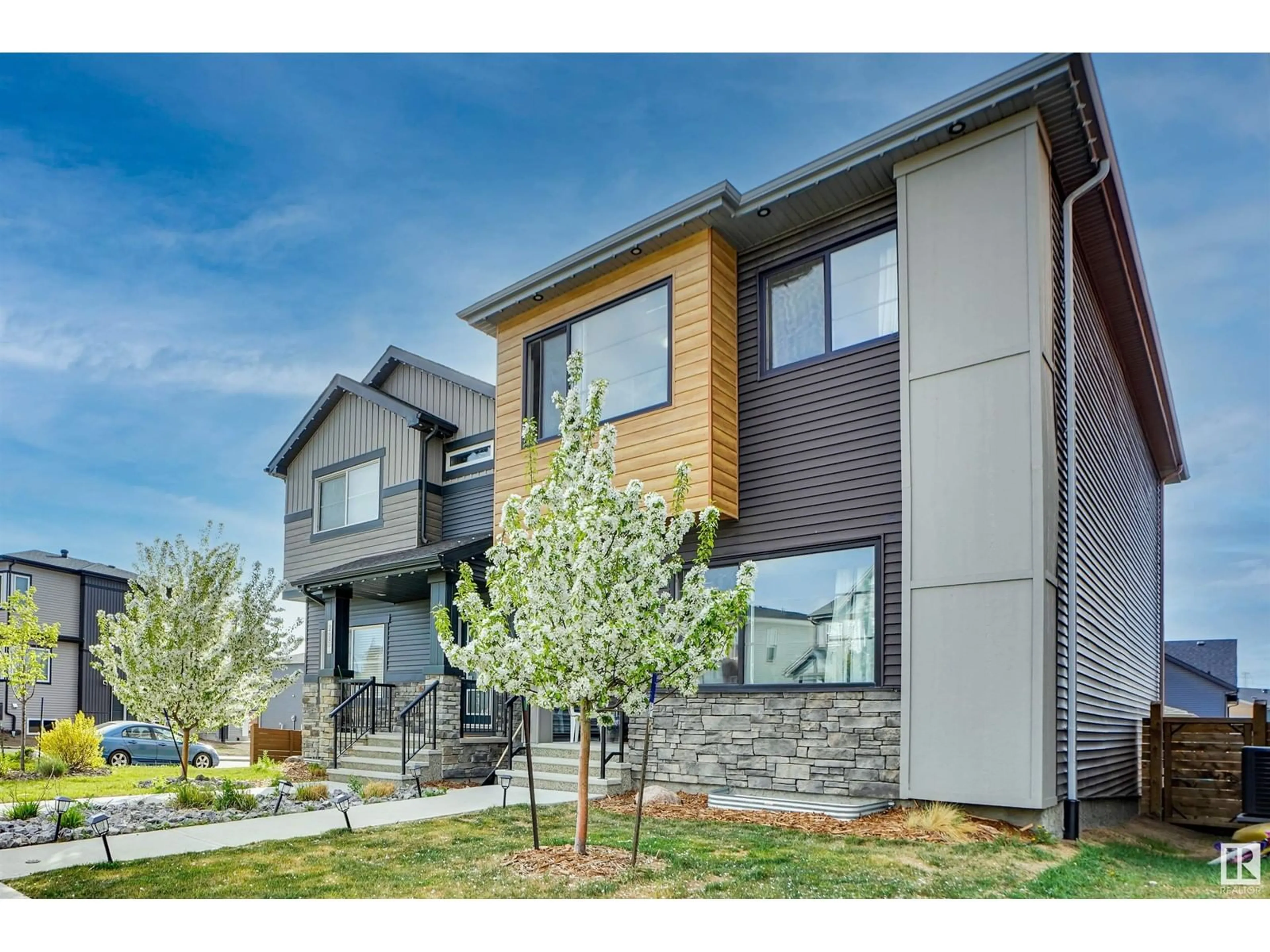 Home with brick exterior material, street for 266 CHARLESWORTH DR, Edmonton Alberta T6X2P4