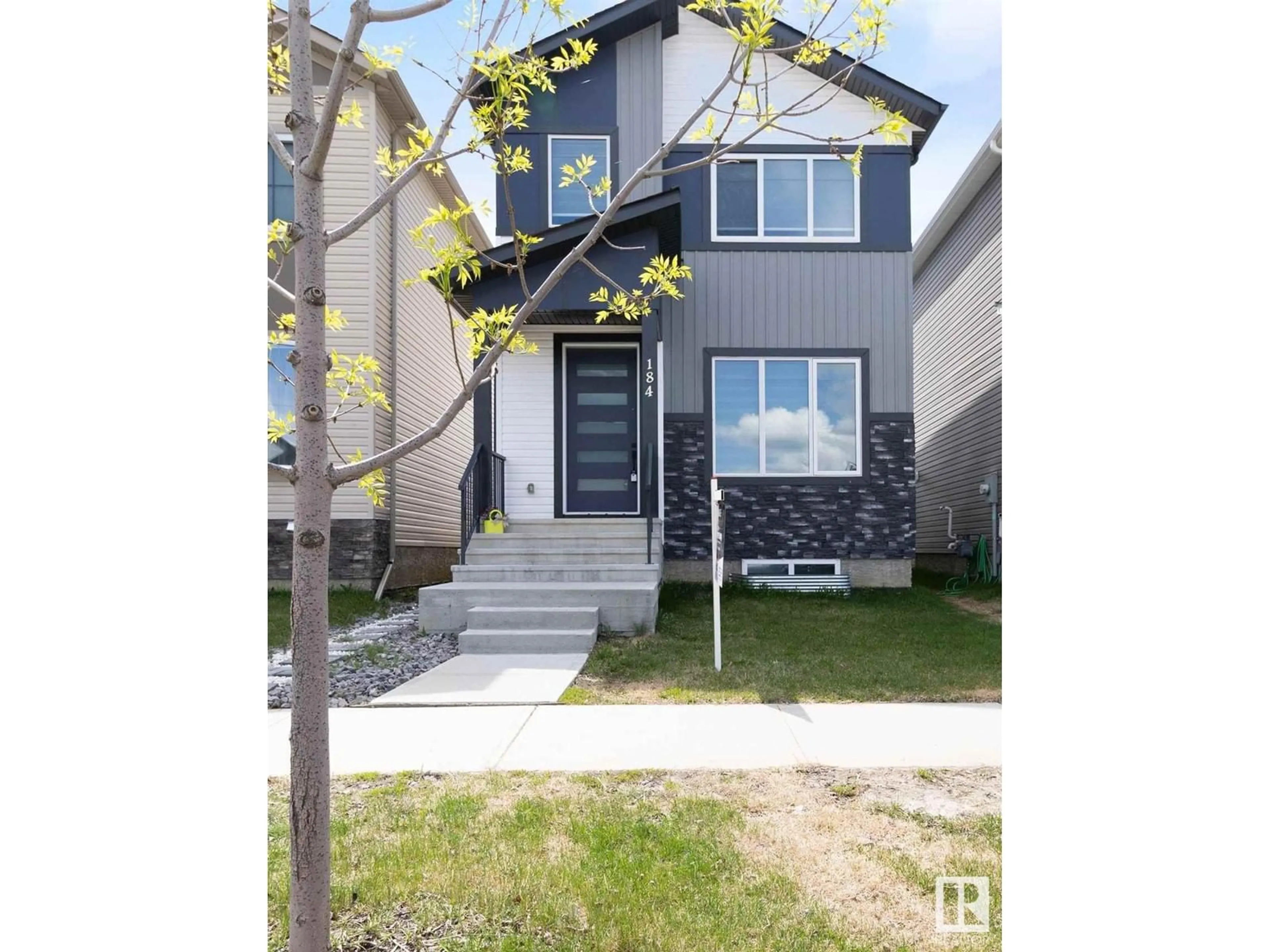 Home with vinyl exterior material, street for 184 CALEDONIA DR, Leduc Alberta T9E0S9