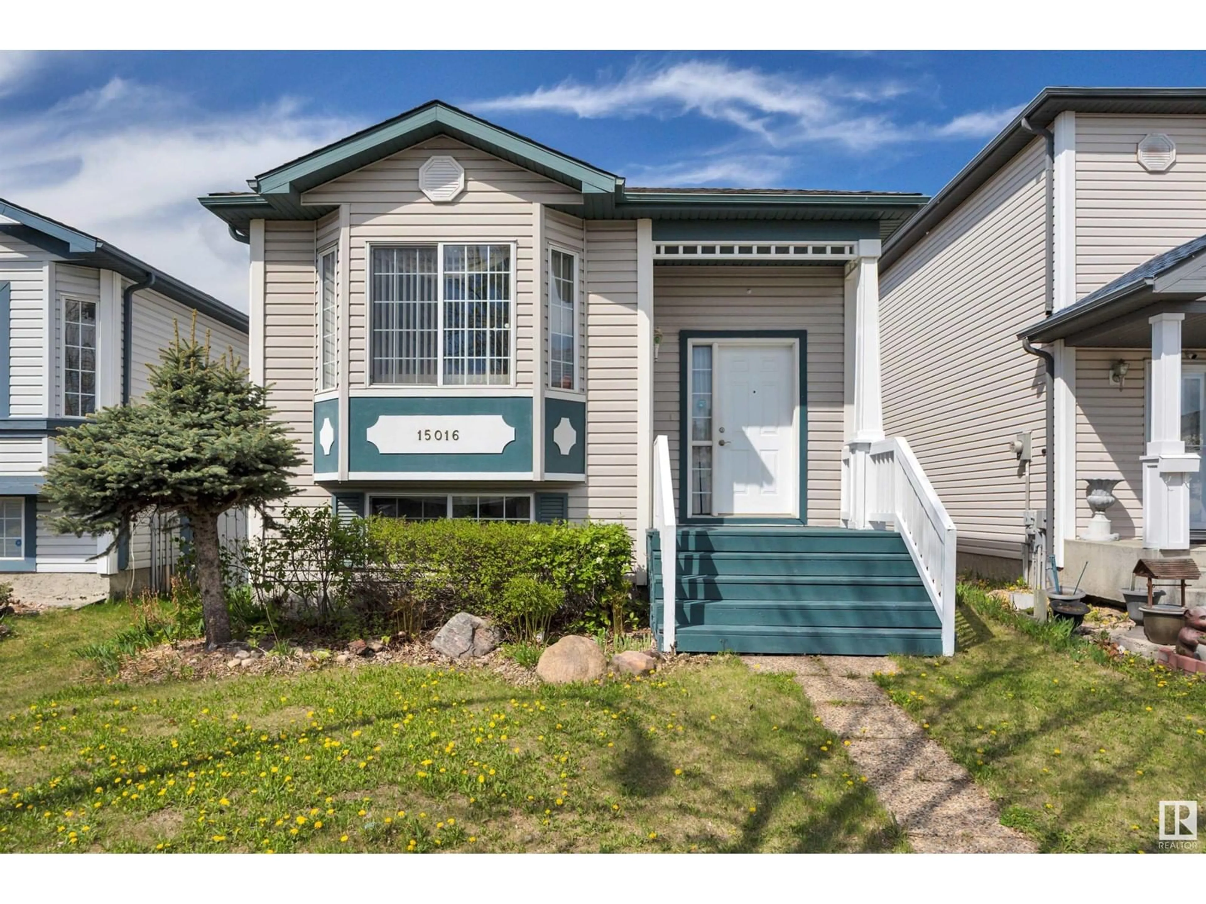 Home with vinyl exterior material, street for NW - 15016 134 ST, Edmonton Alberta T6V1M6