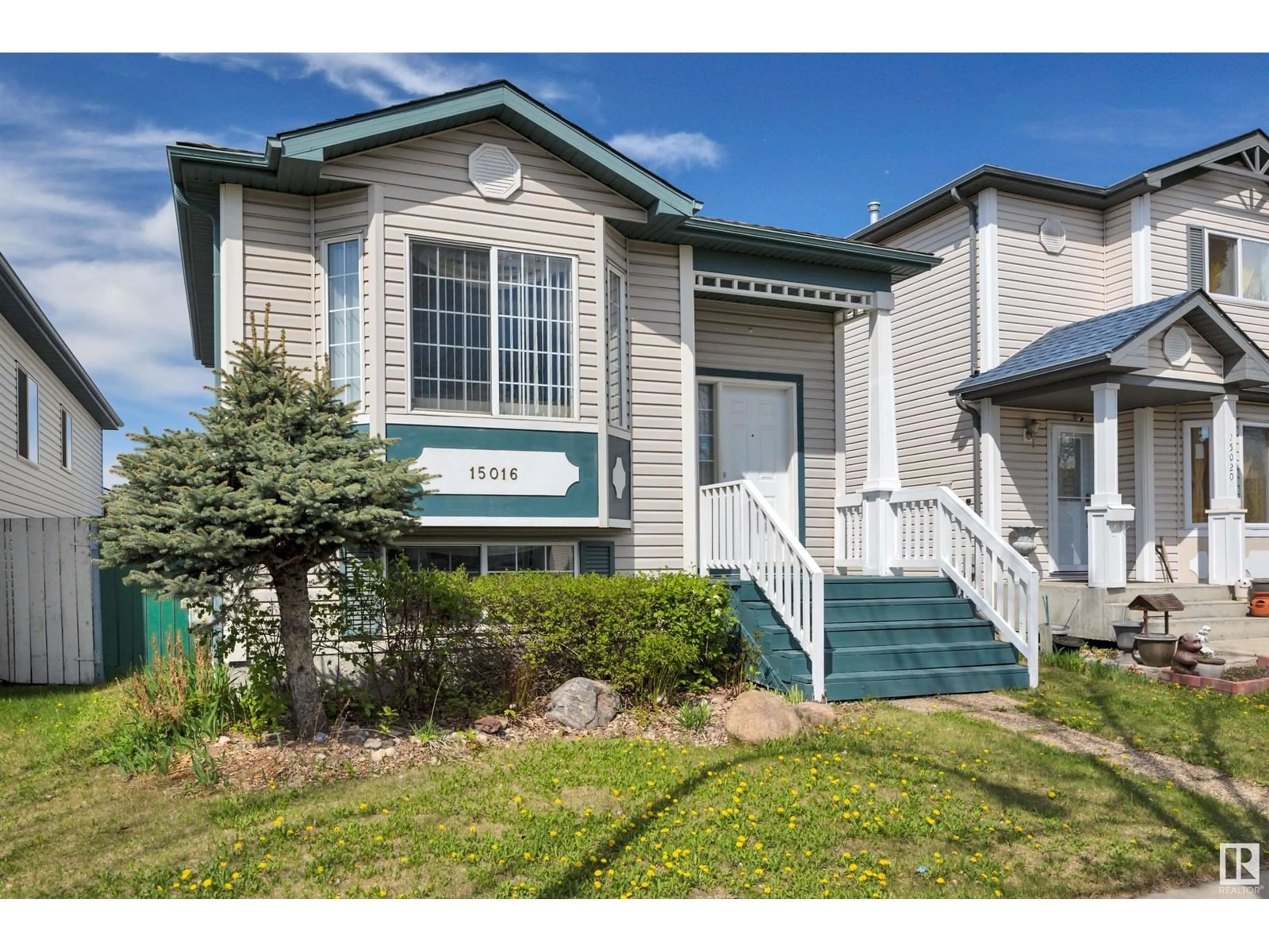 Home with vinyl exterior material, street for NW - 15016 134 ST, Edmonton Alberta T6V1M6