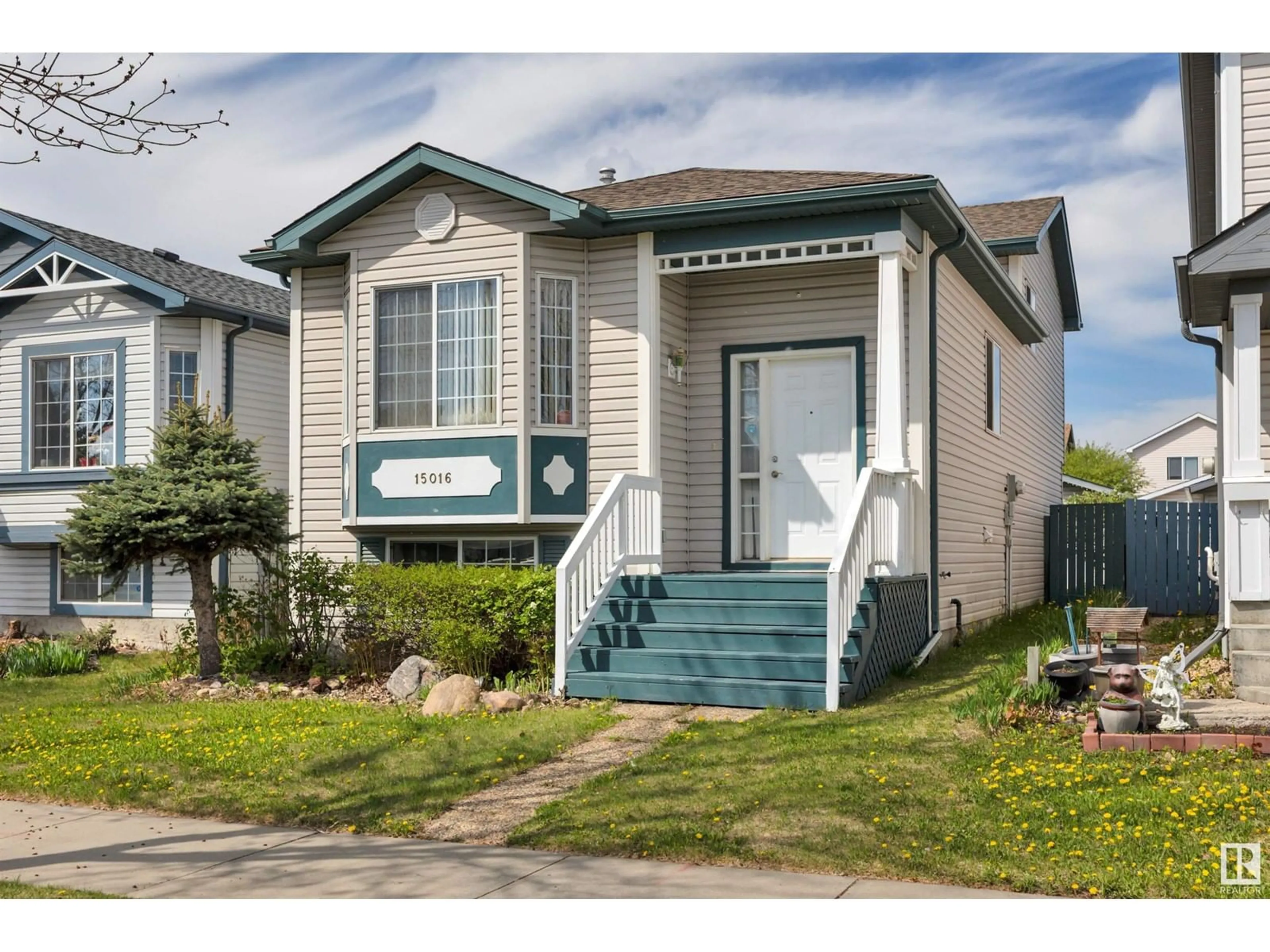Home with vinyl exterior material, street for NW - 15016 134 ST, Edmonton Alberta T6V1M6