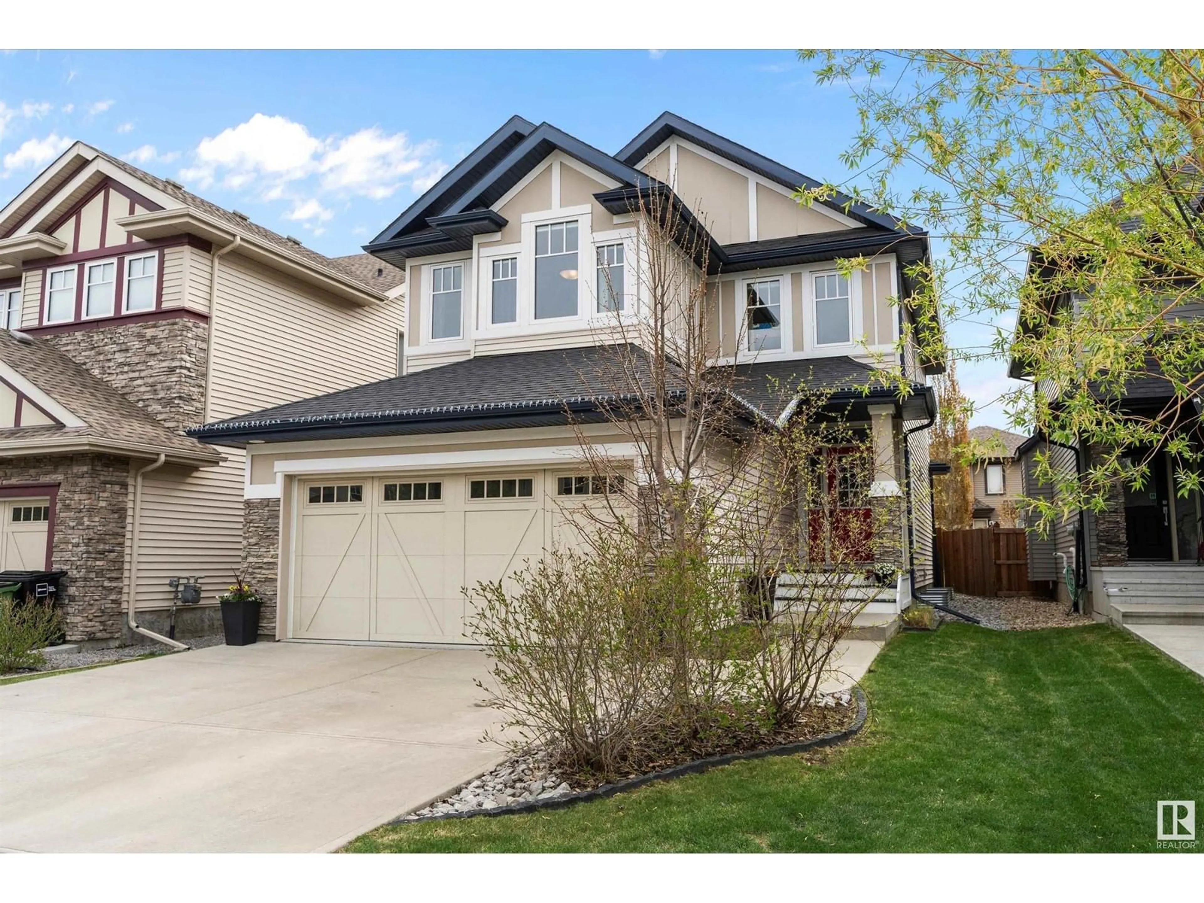 Home with vinyl exterior material, street for 3237 ALLAN WY, Edmonton Alberta T6W2K3