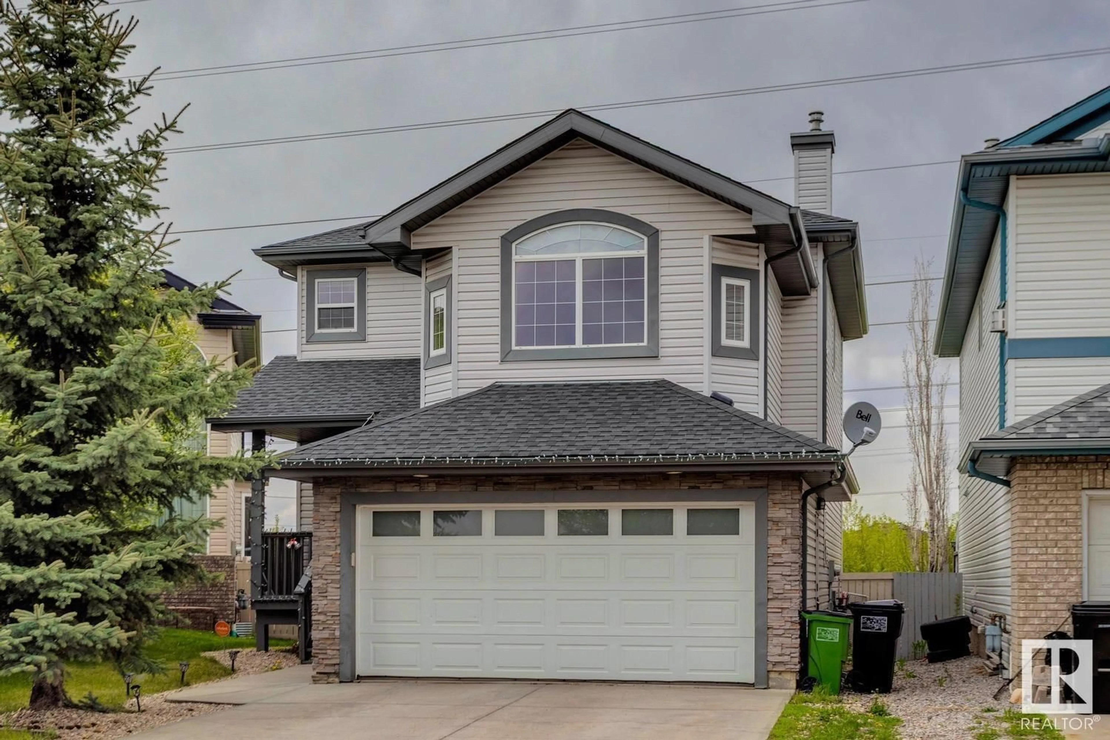 Home with vinyl exterior material, street for 731 LAUBER CR, Edmonton Alberta T6R3J8