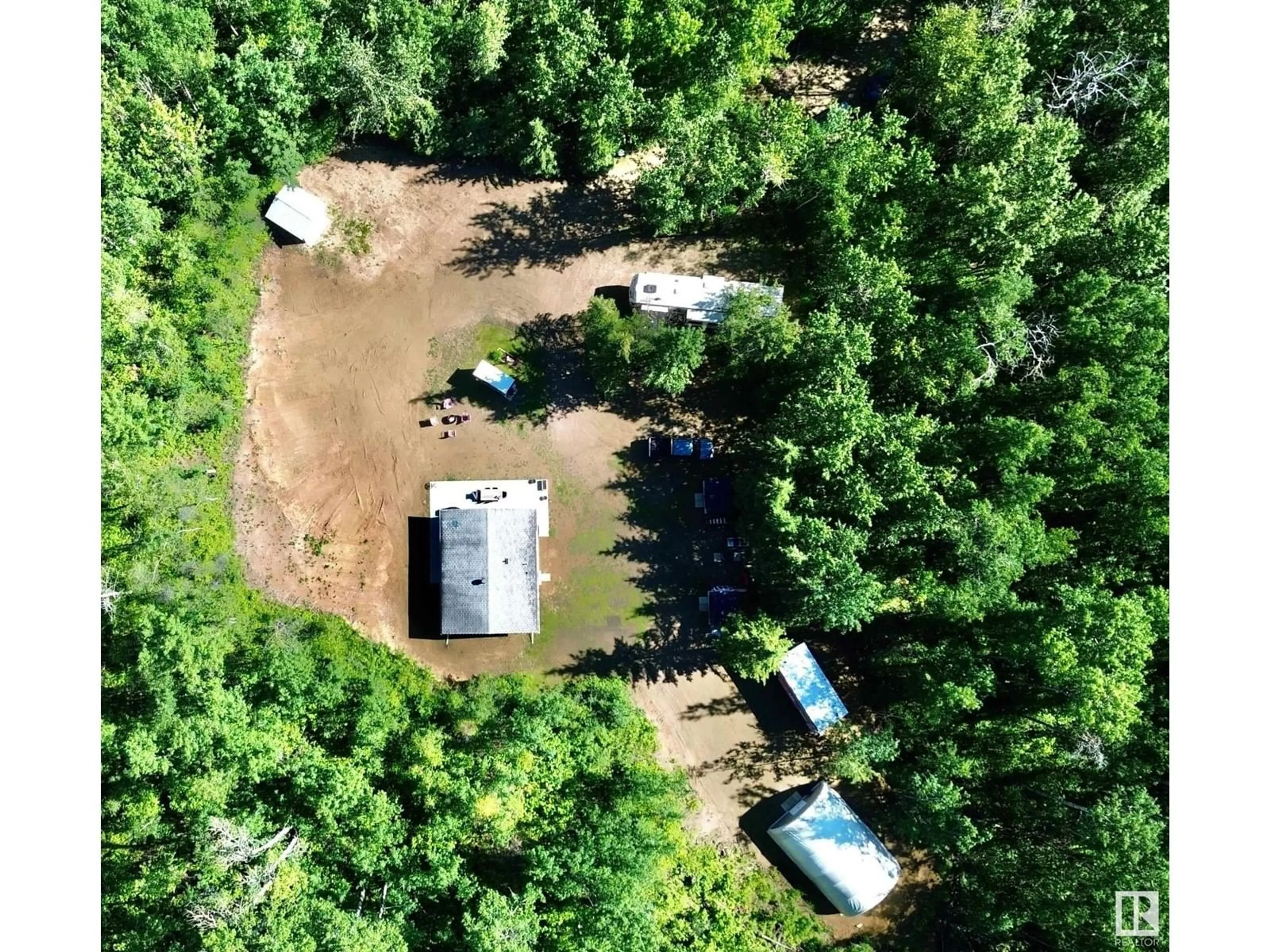 A pic from outside/outdoor area/front of a property/back of a property/a pic from drone, forest/trees view for 101 GLENHAVEN CR, Rural Wetaskiwin County Alberta T0C2C0