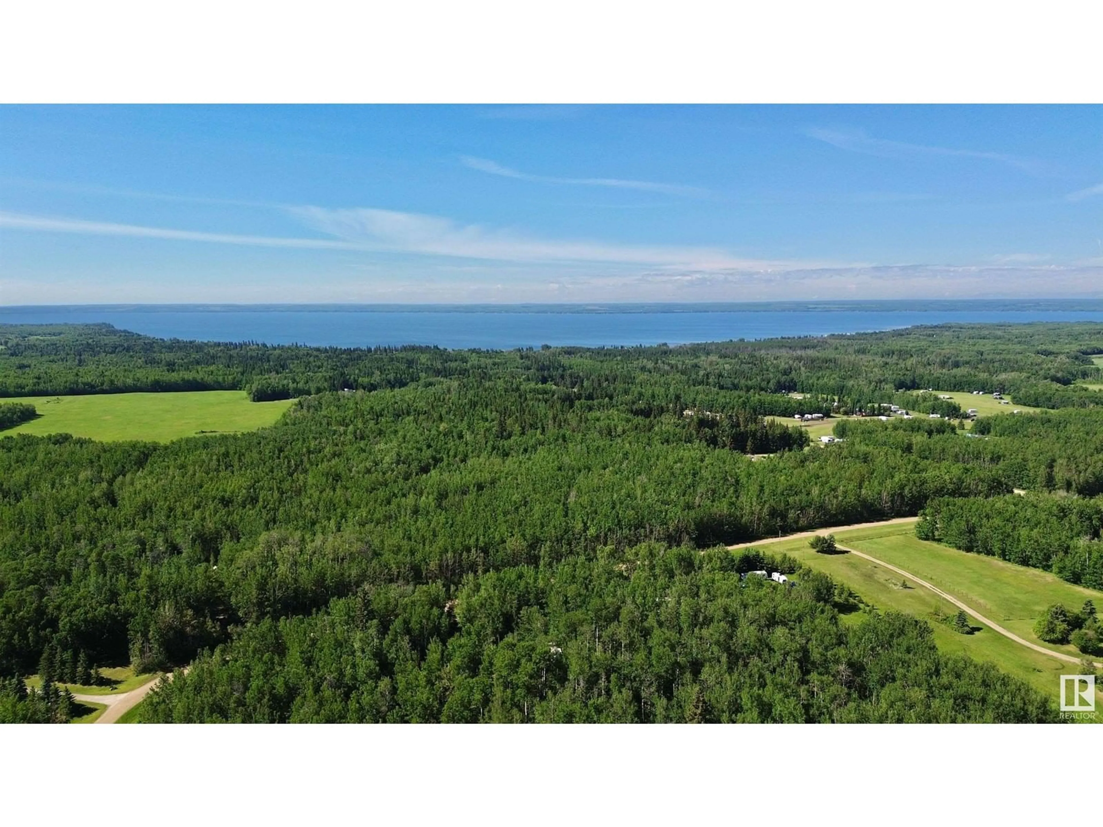 A pic from outside/outdoor area/front of a property/back of a property/a pic from drone, forest/trees view for 101 GLENHAVEN CR, Rural Wetaskiwin County Alberta T0C2C0