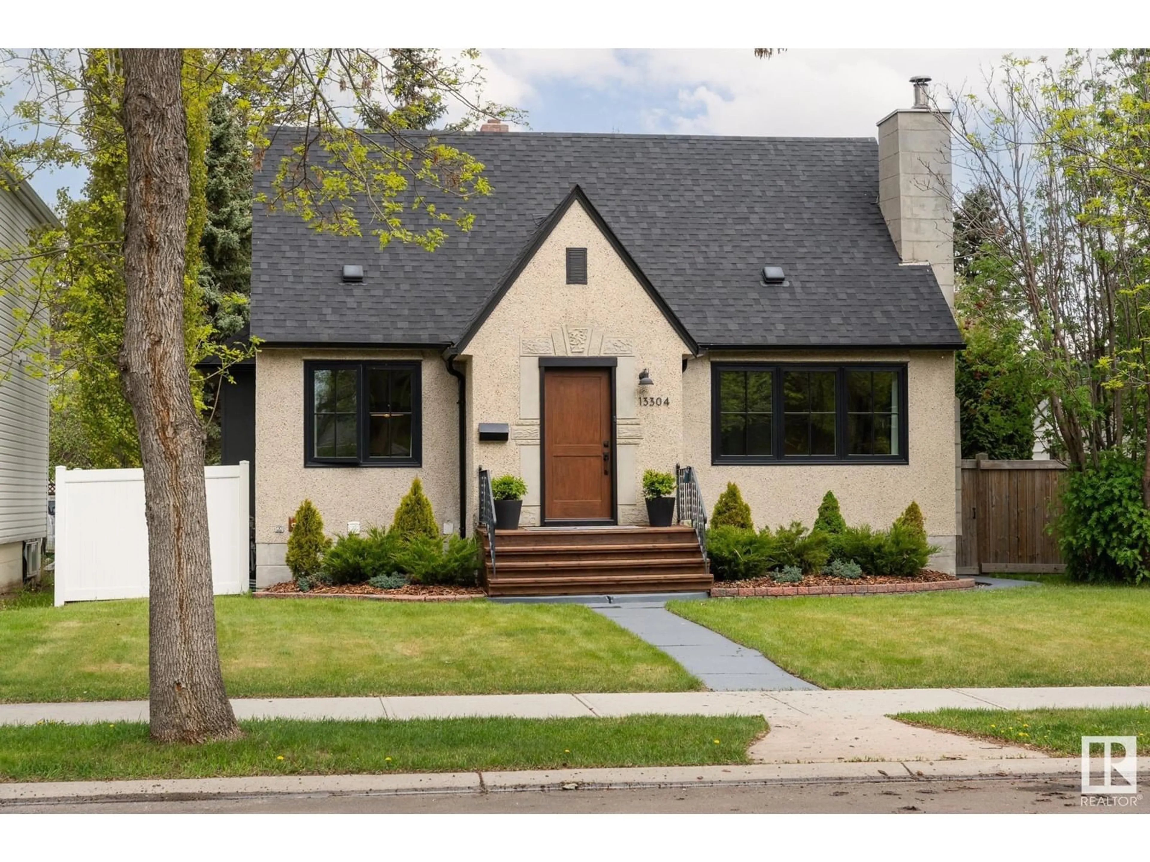 Home with brick exterior material, street for 13304 109 AV, Edmonton Alberta T5M2G5