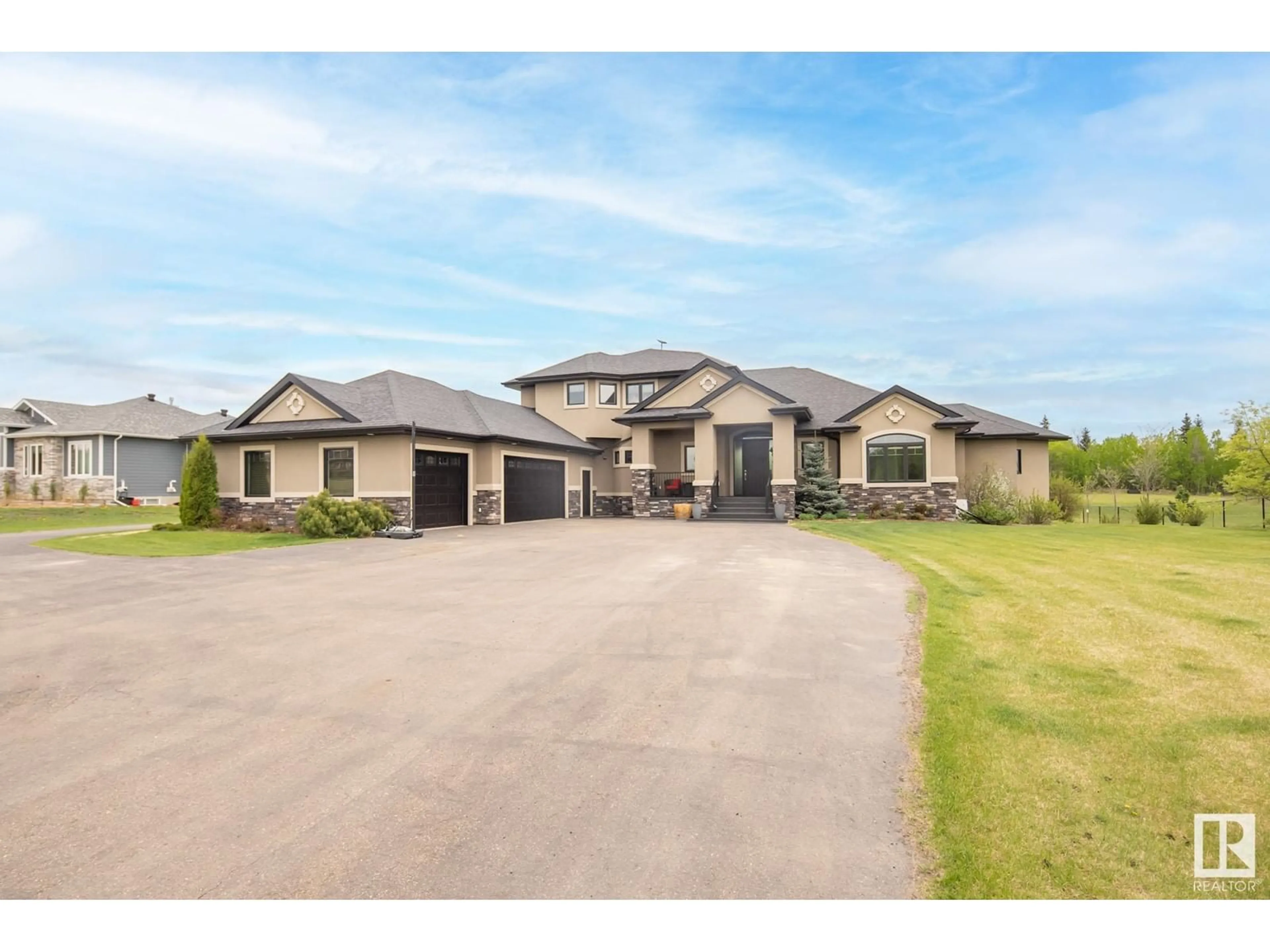 A pic from outside/outdoor area/front of a property/back of a property/a pic from drone, unknown for #15 - 27320 TWP ROAD 534, Rural Parkland County Alberta T7X3T1