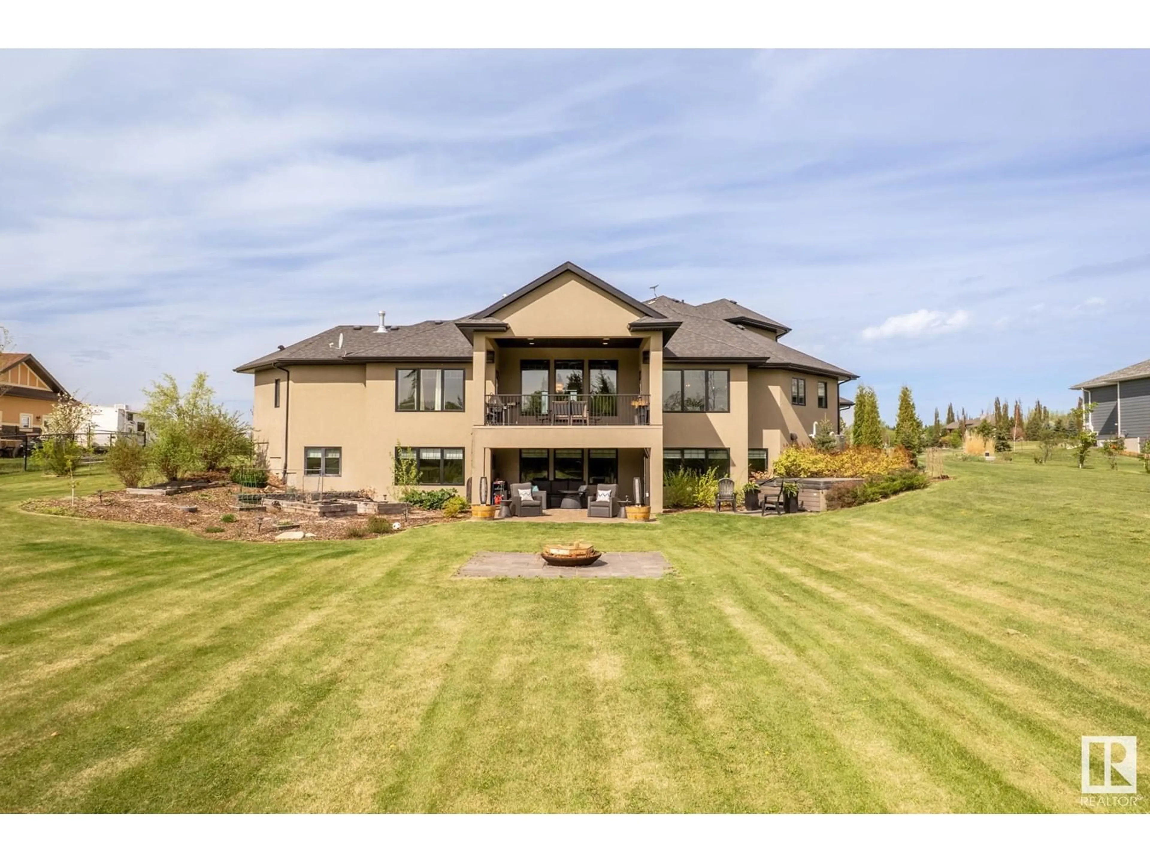 A pic from outside/outdoor area/front of a property/back of a property/a pic from drone, unknown for #15 - 27320 TWP ROAD 534, Rural Parkland County Alberta T7X3T1