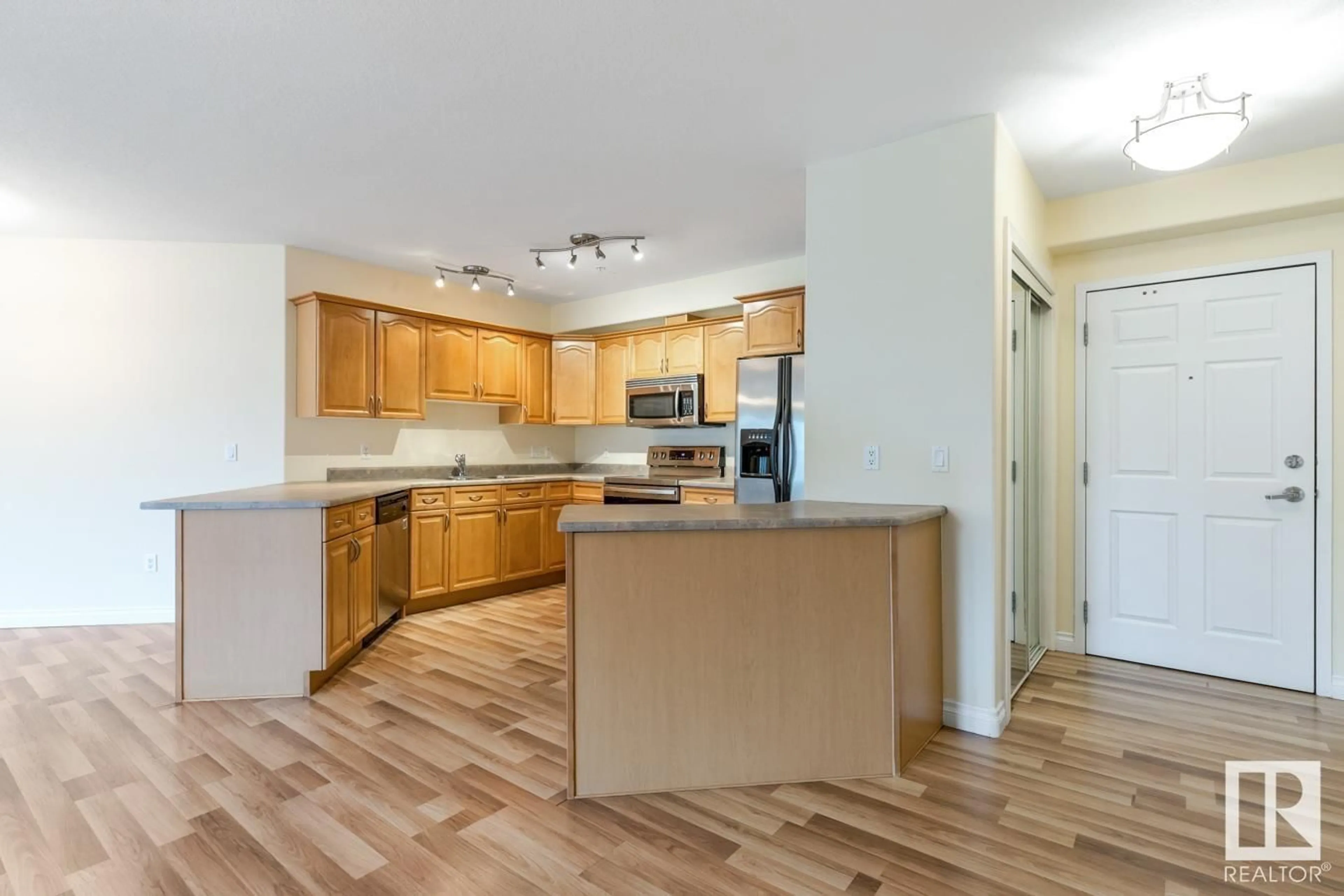 Open concept kitchen, unknown for #102 - 9739 92 ST, Edmonton Alberta T6C3S3
